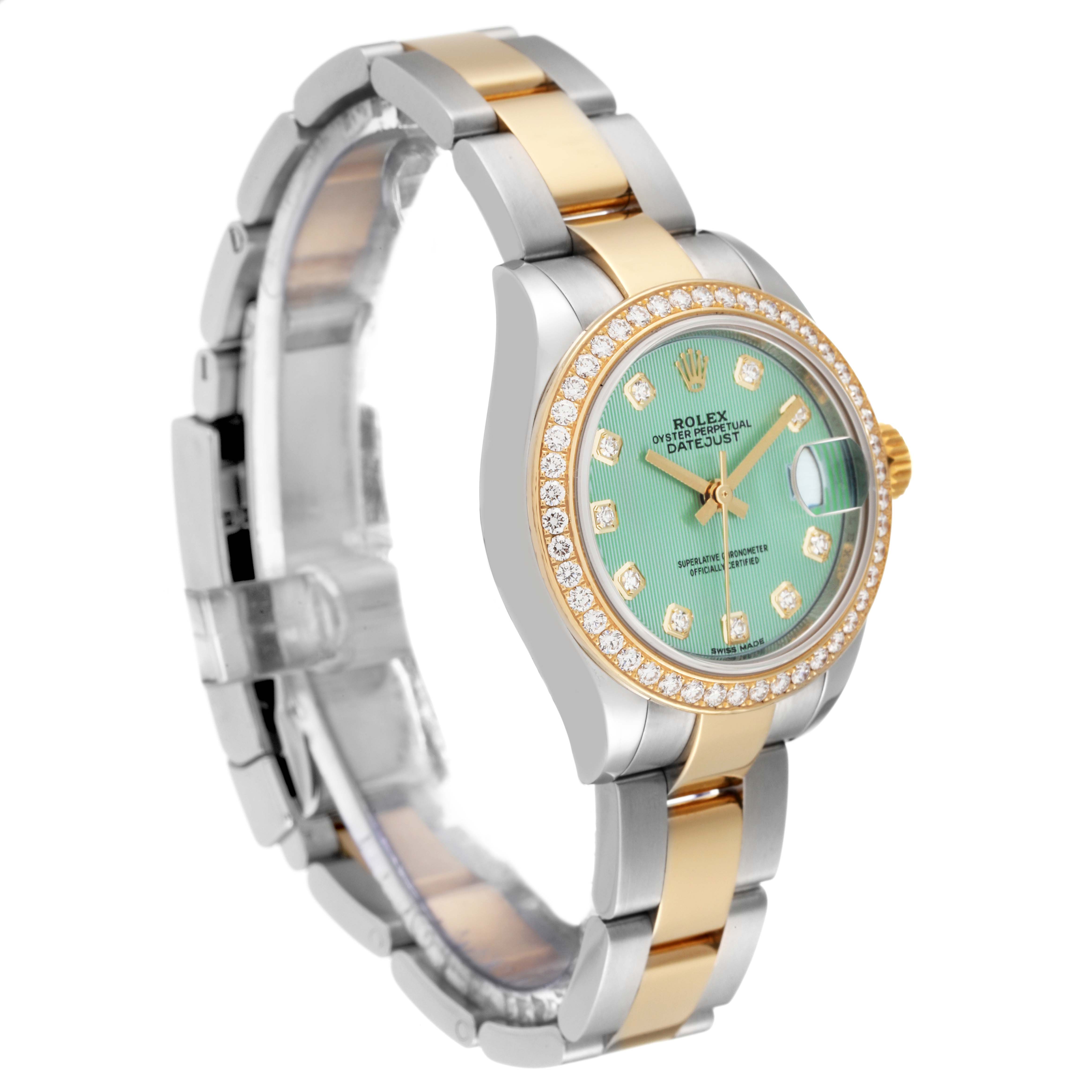 The image shows a Rolex Datejust 279383 Women's Steel and Gold (two tone) Green Dial 279383 Women's Steel and Gold (two tone) Green Dial watch angled from the left side, highlighting its green dial, diamond bezel, and two-tone bracelet.