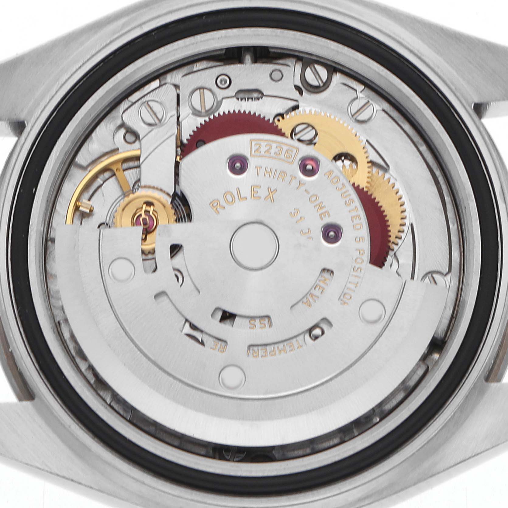 The image shows the movement of a Rolex Datejust 279174 Women's Stainless Steel Silver Dial watch from a back angle, highlighting gears and the rotor.