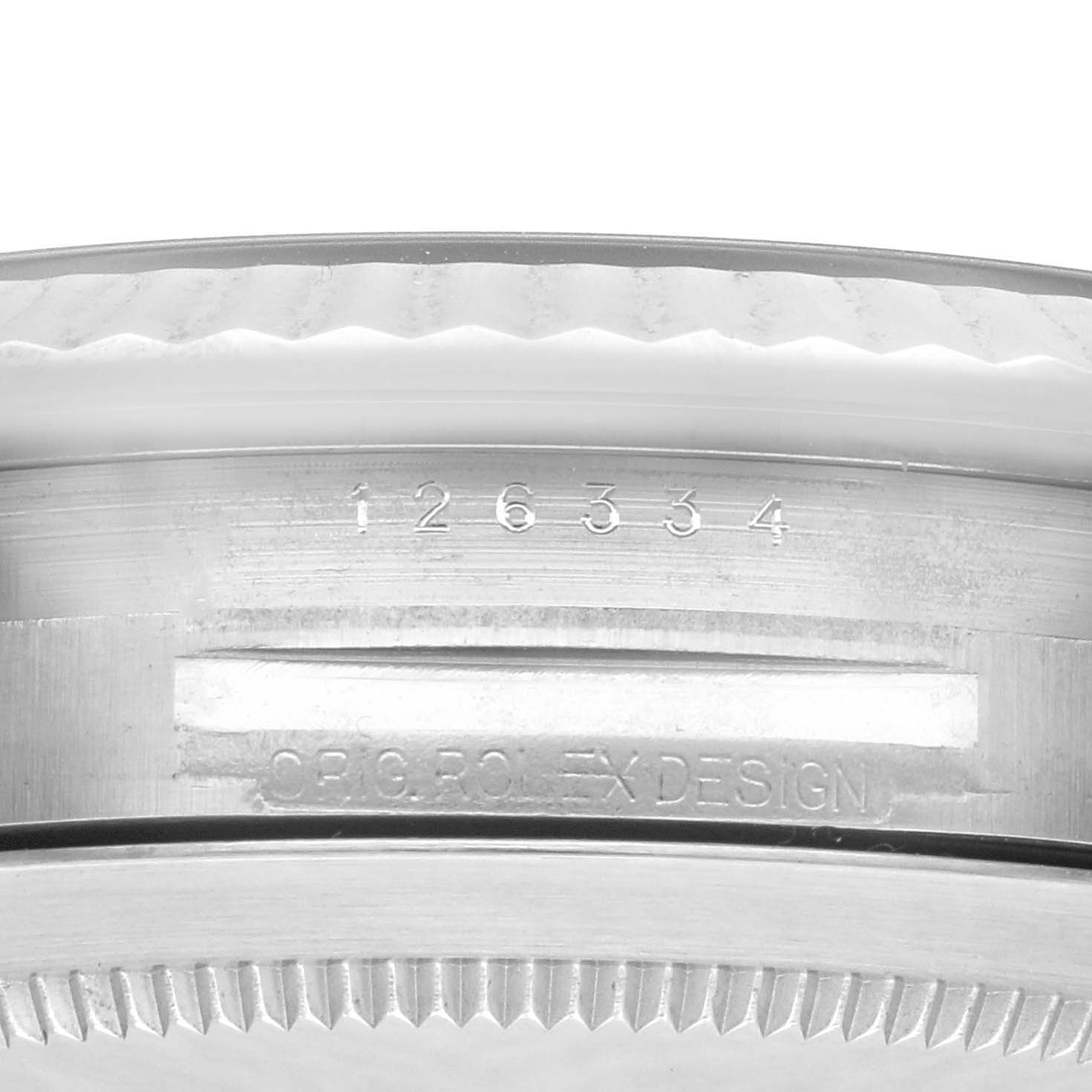 The image shows a close-up of the case side and engraving of a Rolex Datejust 41 126334 Men's Stainless Steel Blue Dial 126334 Men's Stainless Steel Blue Dial, highlighting its serial and design numbers.