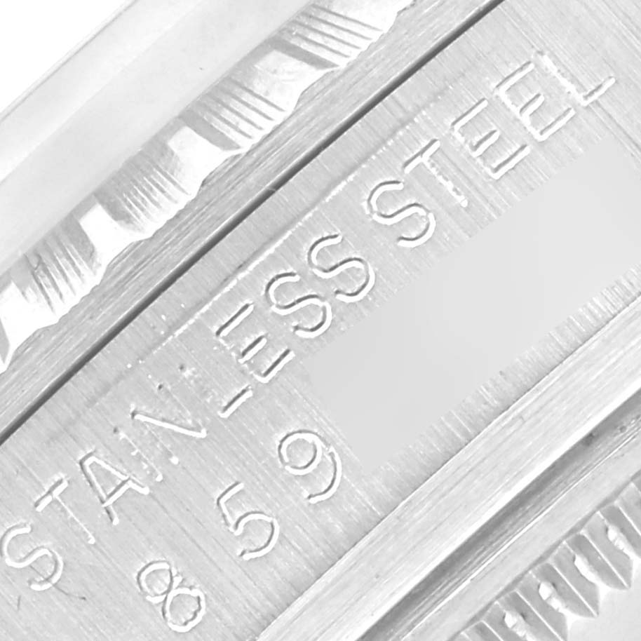 A close-up shows the engraving on the edge of the Rolex Vintage Collection 16030 Men's Stainless Steel Silver Dial 16030 Men's Stainless Steel Silver Dial watch with "STAINLESS STEEL" visible.