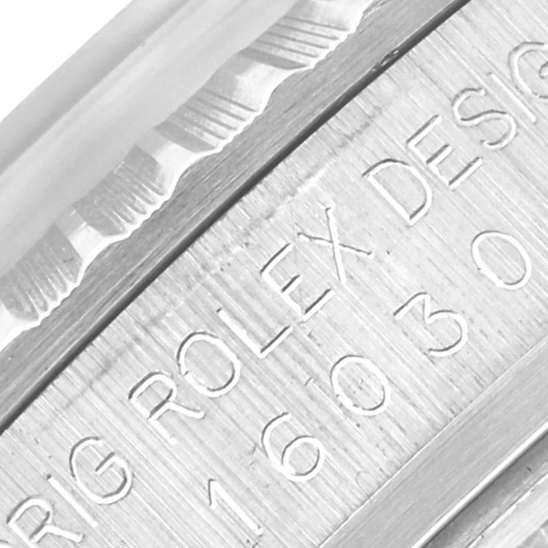 The image shows an engraved side view of the casing of a Rolex Vintage Collection 16030 Men's Stainless Steel Silver Dial 16030 Men's Stainless Steel Silver Dial watch, highlighting the design engraving.