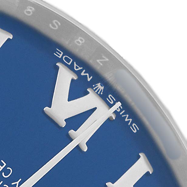 The image shows a close-up of the Rolex Mid-Size 278240 Women's Stainless Steel Blue Dial watch face with focus on the dial and hour markers.