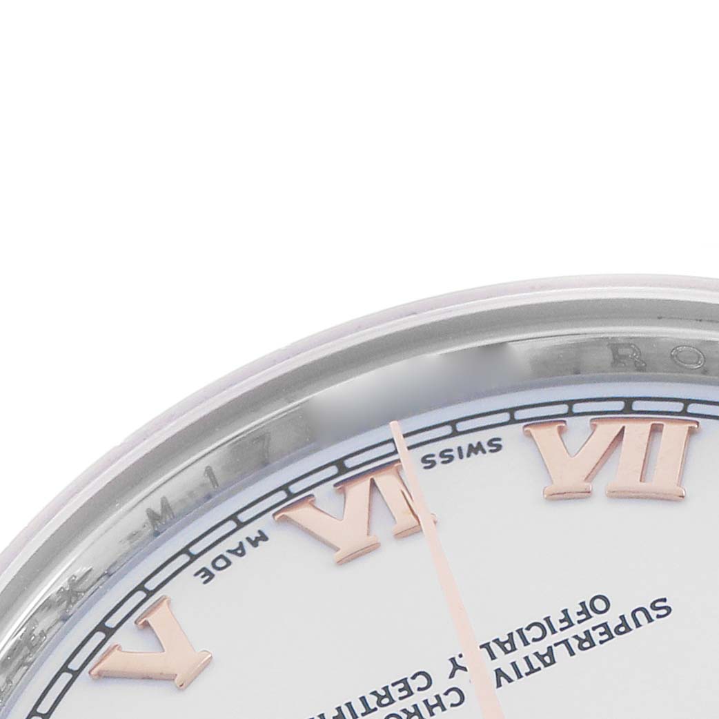 This image shows a close-up of the Rolex Mid-Size 178241 Women's Steel and Gold (two tone) White Dial watch face, highlighting Roman numerals and part of the bezel.