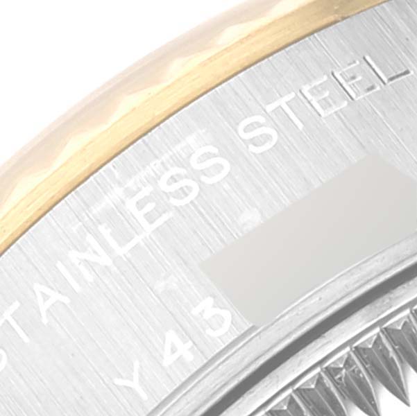 The image shows a close-up of the bezel and part of the case of a Rolex Datejust 79173 Women's Steel and Gold (two tone) Mother of Pearl Dial 79173 Women's Steel and Gold (two tone) Mother of Pearl Dial watch.