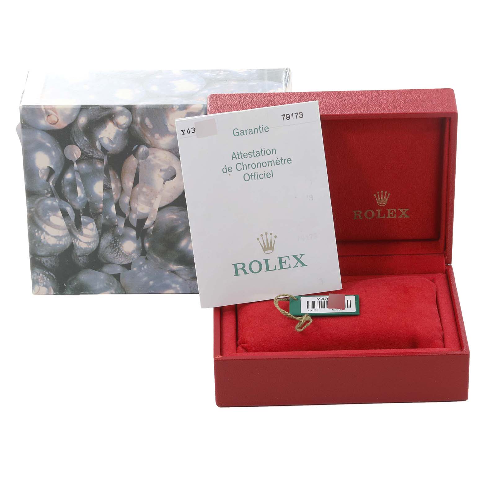 The image shows the box, warranty card, and tag of a Rolex Datejust 79173 Women's Steel and Gold (two tone) Mother of Pearl Dial 79173 Women's Steel and Gold (two tone) Mother of Pearl Dial watch.
