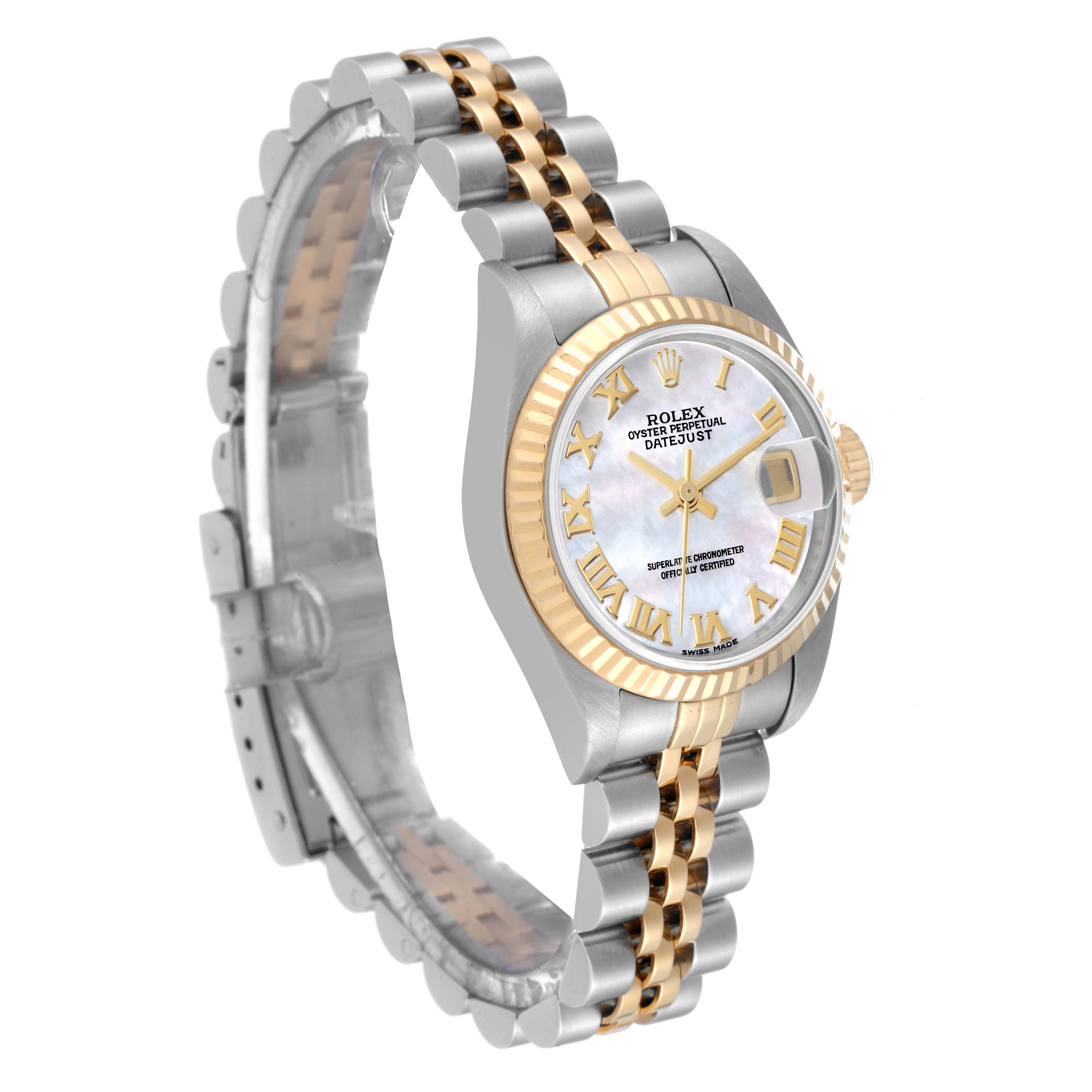 The image shows an angled view of a Rolex Datejust 79173 Women's Steel and Gold (two tone) Mother of Pearl Dial 79173 Women's Steel and Gold (two tone) Mother of Pearl Dial watch with a two-tone metal bracelet and a fluted bezel.