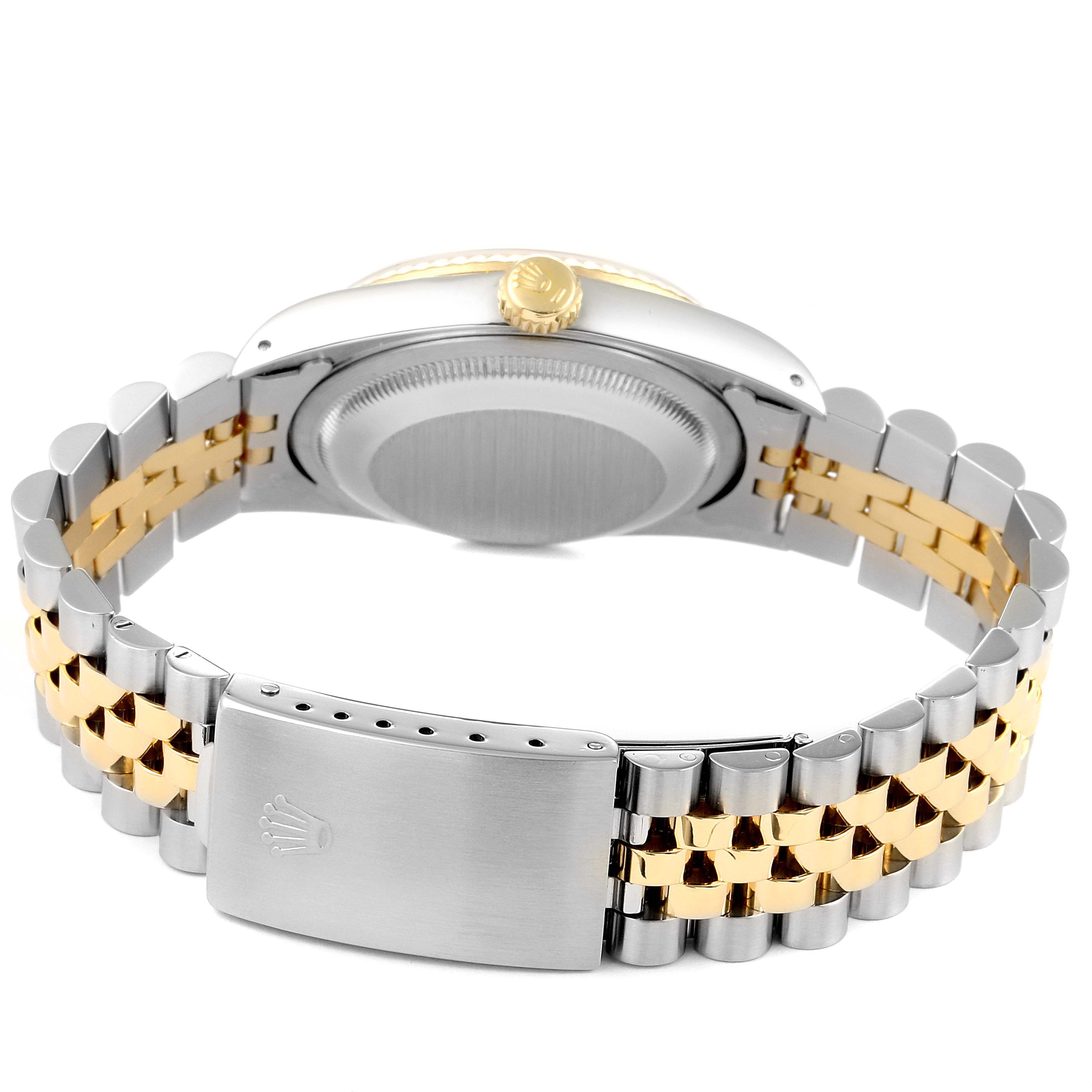 The image shows the back view of a Rolex Datejust 16233 Men's Steel and Gold (two tone) Champagne Dial 16233 Men's Steel and Gold (two tone) Champagne Dial watch highlighting its two-tone bracelet and case back.