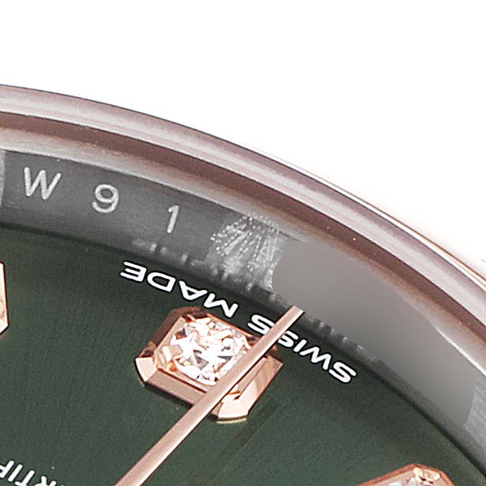 The image shows a close-up of the dial and part of the hour markers of a Rolex Datejust 279161 Women's Steel and Gold (two tone) Green Dial 279161 Women's Steel and Gold (two tone) Green Dial watch.