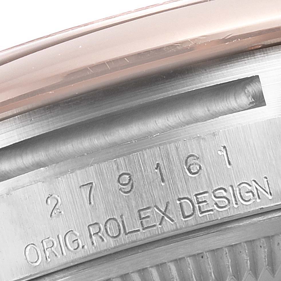 The image shows a close-up of the side engraving on a Rolex Datejust 279161 Women's Steel and Gold (two tone) Green Dial 279161 Women's Steel and Gold (two tone) Green Dial watch case, highlighting the serial number and "ORIG. ROLEX DESIGN" text.