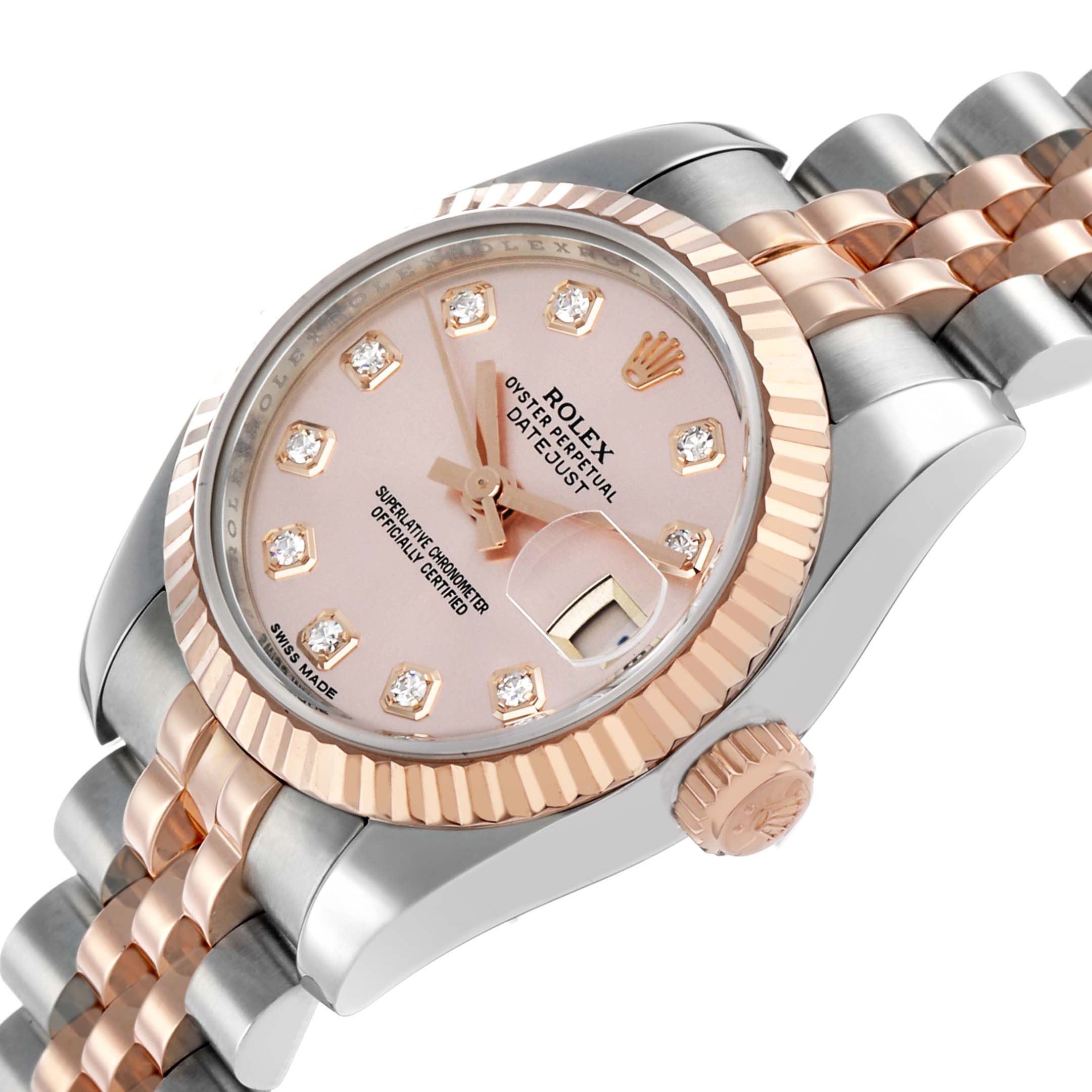 The Rolex Datejust 179171 Women's Steel and Gold (two tone) Pink Dial watch is shown at an angled side view, highlighting the case, fluted bezel, crown, and bracelet.