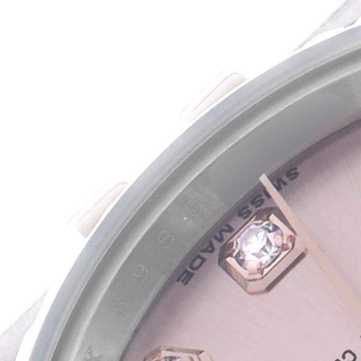 The image shows a close-up of the Rolex Datejust 179171 Women's Steel and Gold (two tone) Pink Dial watch dial, featuring diamond hour markers and partial text "SWISS MADE".