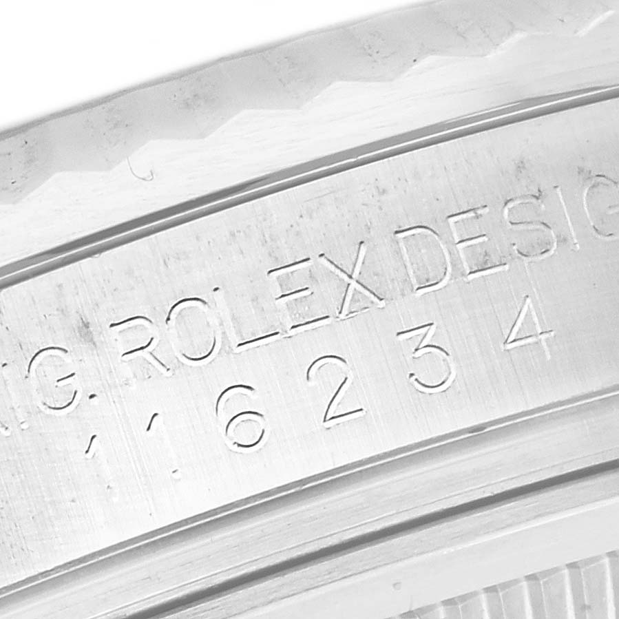 The image shows a close-up of the case side and engraving on the Rolex Datejust 116234 Men's Stainless Steel Pink Dial 116234 Men's Stainless Steel Pink Dial.