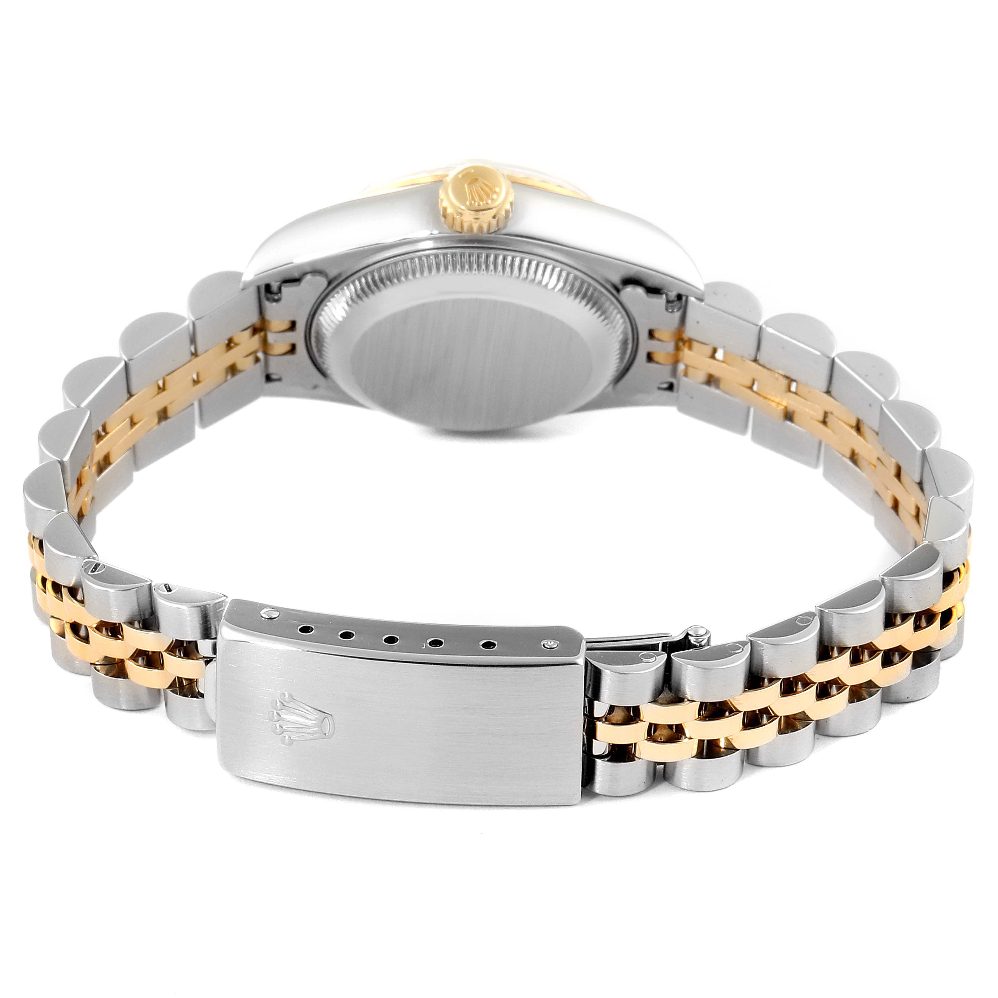 The Rolex Datejust 69173 Women's Steel and Gold (two tone) Silver Dial 69173 Women's Steel and Gold (two tone) Silver Dial watch is shown from the back, focusing on the clasp and bracelet with a view of the caseback and crown.