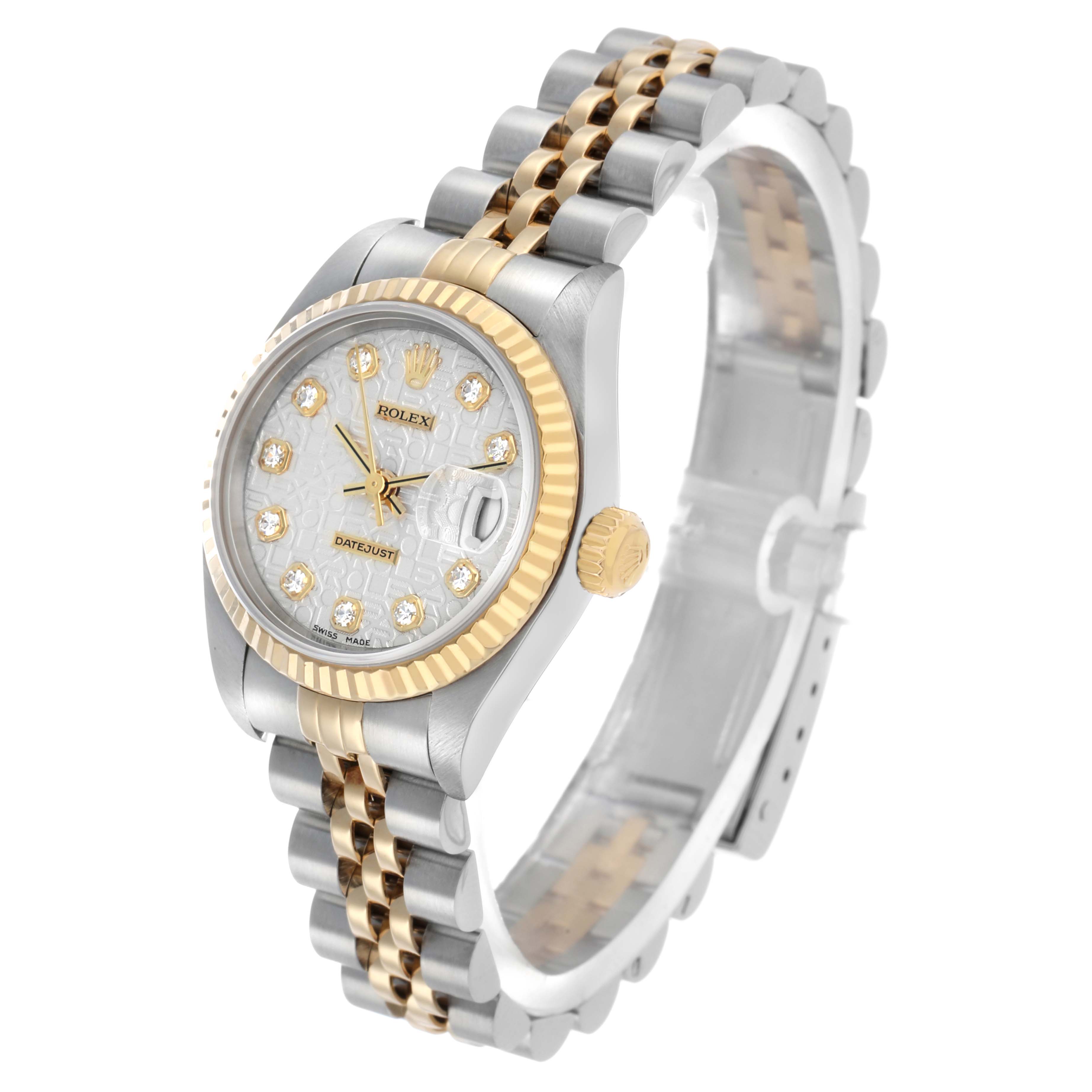 The Rolex Datejust 79173 Women's Steel and Gold (two tone) Silver Dial watch is shown at a 3/4 angle, highlighting the case, bezel, dial, crown, and two-tone Jubilee bracelet.