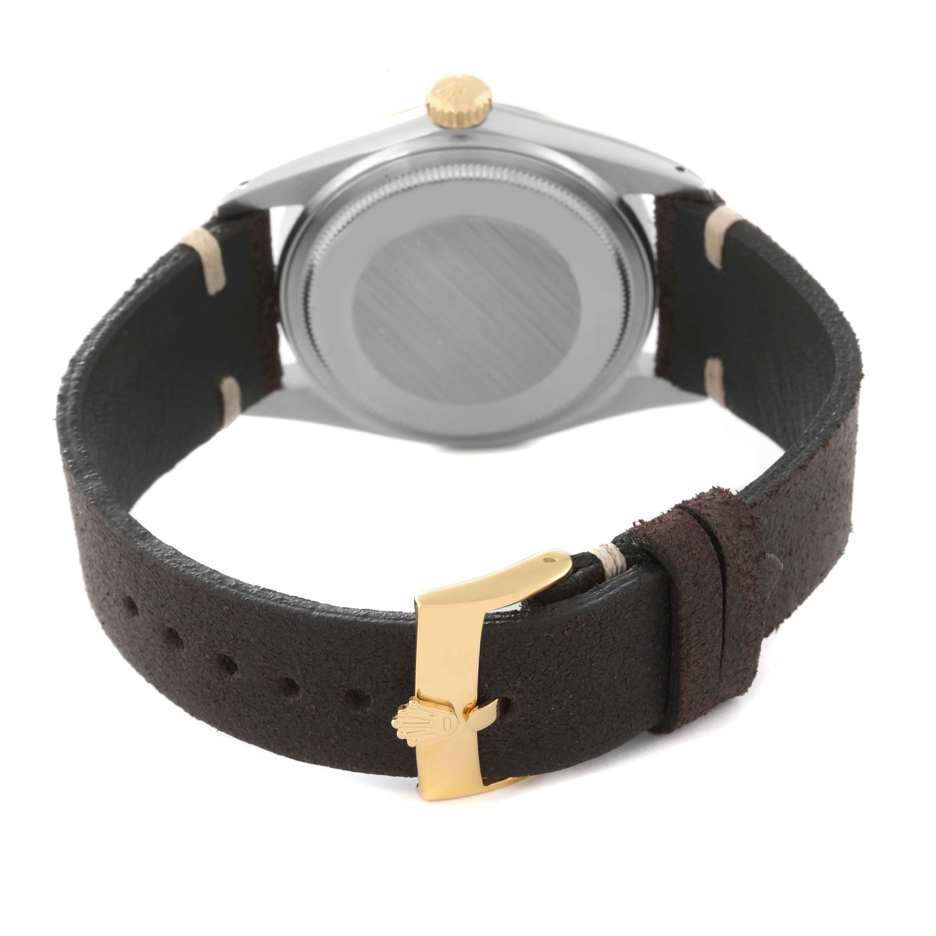 The image shows the back of a Rolex Vintage Collection 16013 Men's Steel and Gold (two tone) Champagne Dial watch with a leather strap and gold buckle clasp.