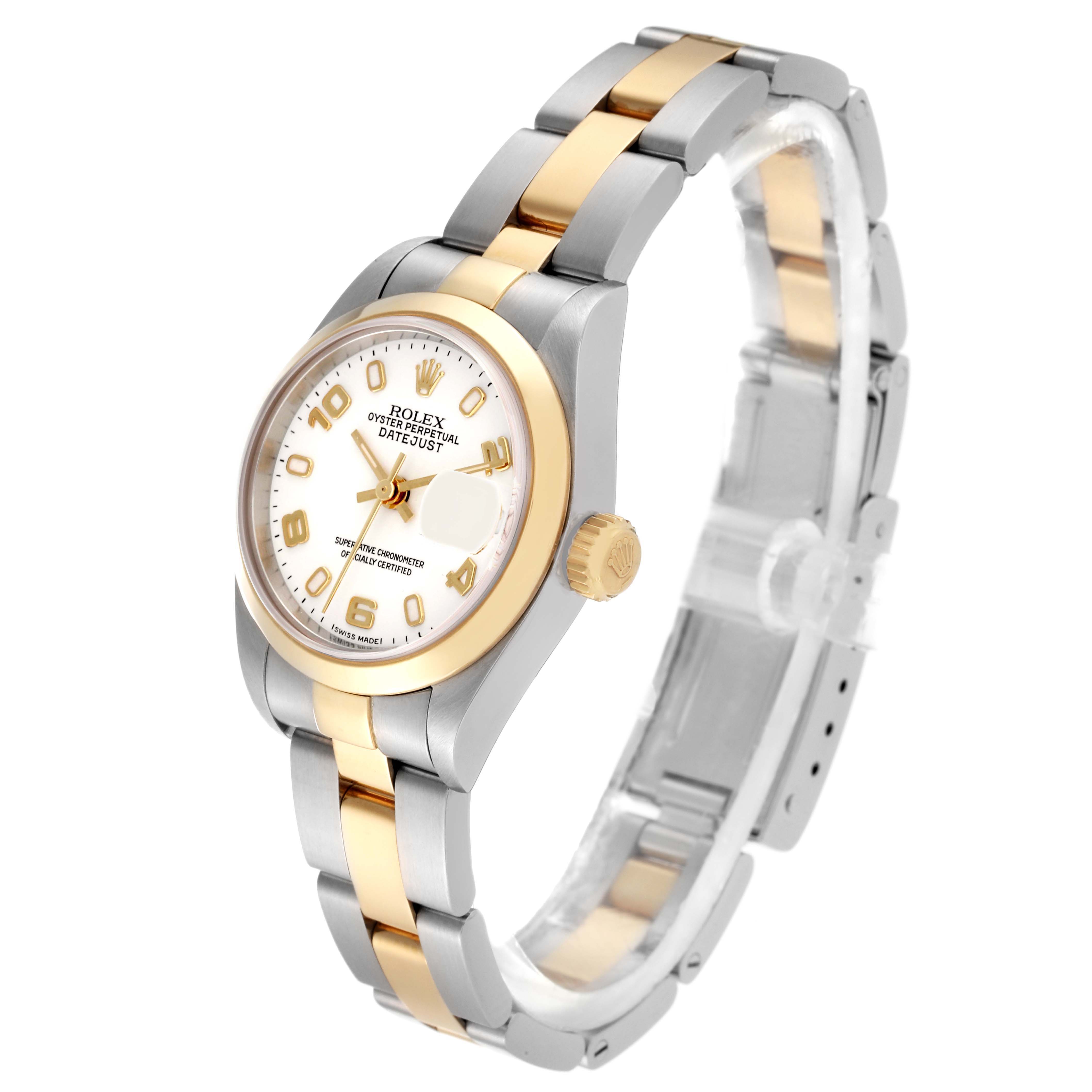 The Rolex Datejust 79163 Women
s Steel and Gold (two tone) White Dial 79163 Women
s Steel and Gold (two tone) White Dial watch is shown at a slight front angle, displaying the face, bezel, and part of the bracelet.