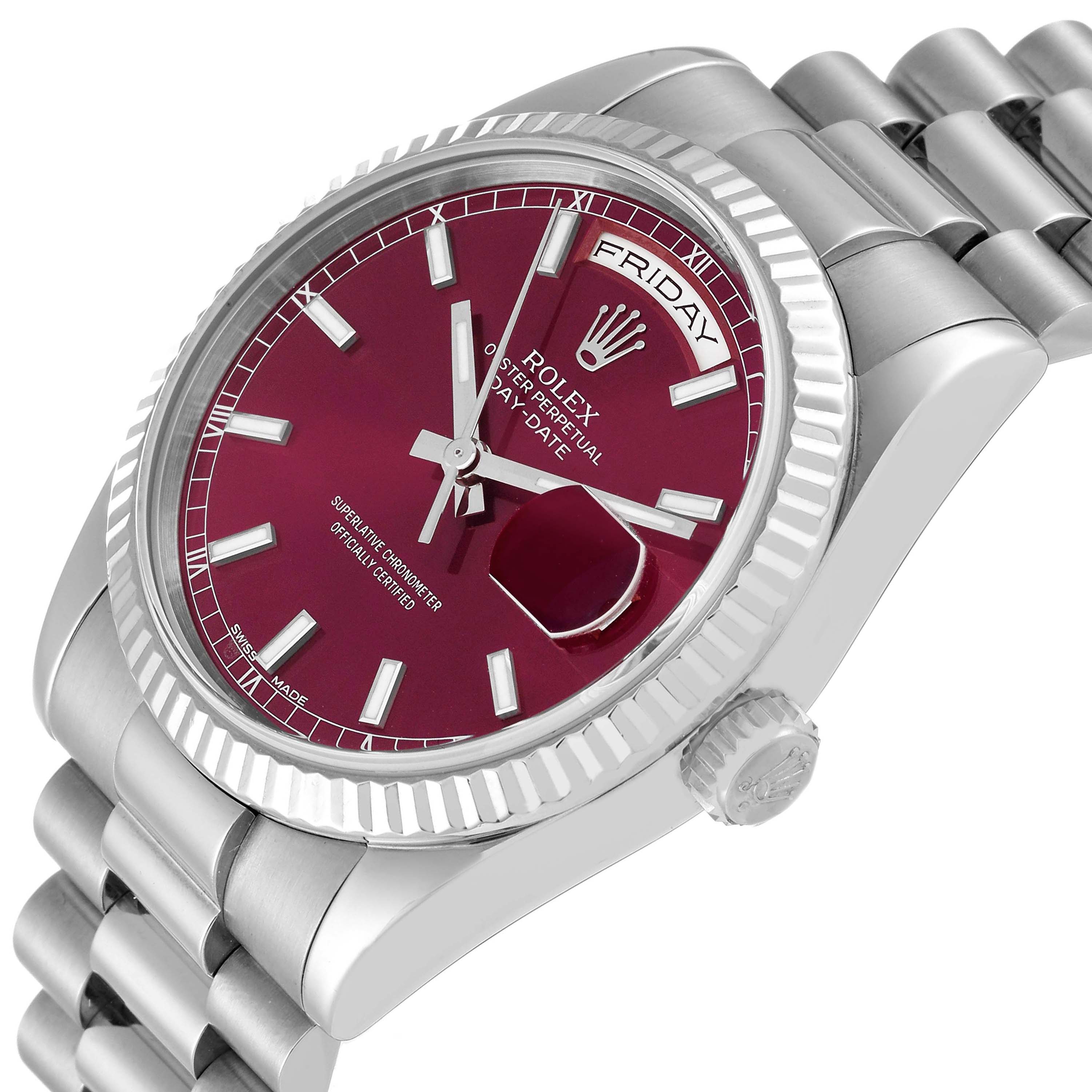 The image shows a side angle of the Rolex President 118239 Men's White Gold Pink Dial 118239 Men's White Gold Pink Dial watch, highlighting its burgundy dial, fluted bezel, and bracelet.