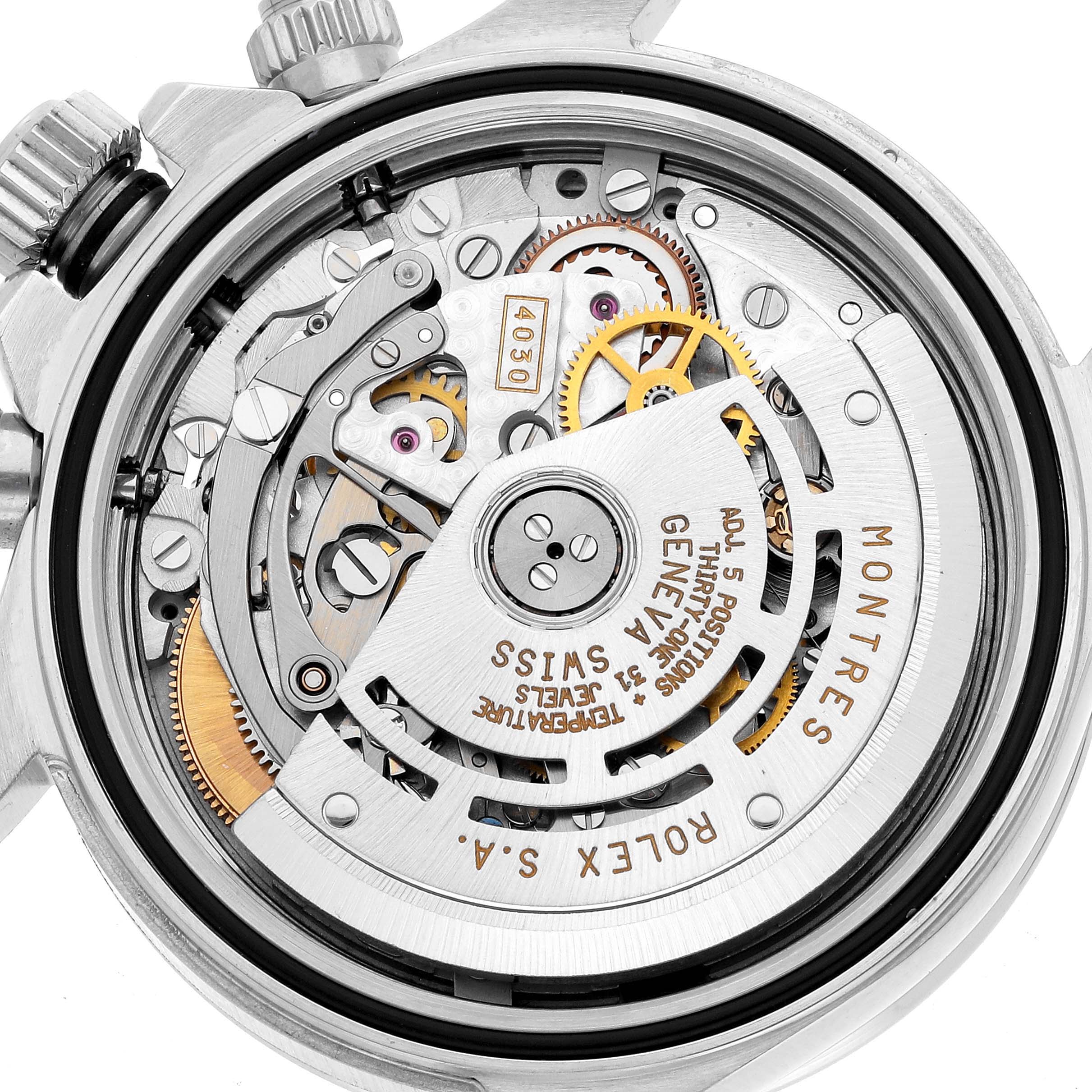 The image shows the movement and internal mechanics of a Rolex Daytona 16520 Men's Stainless Steel White Dial watch from a rear angle.