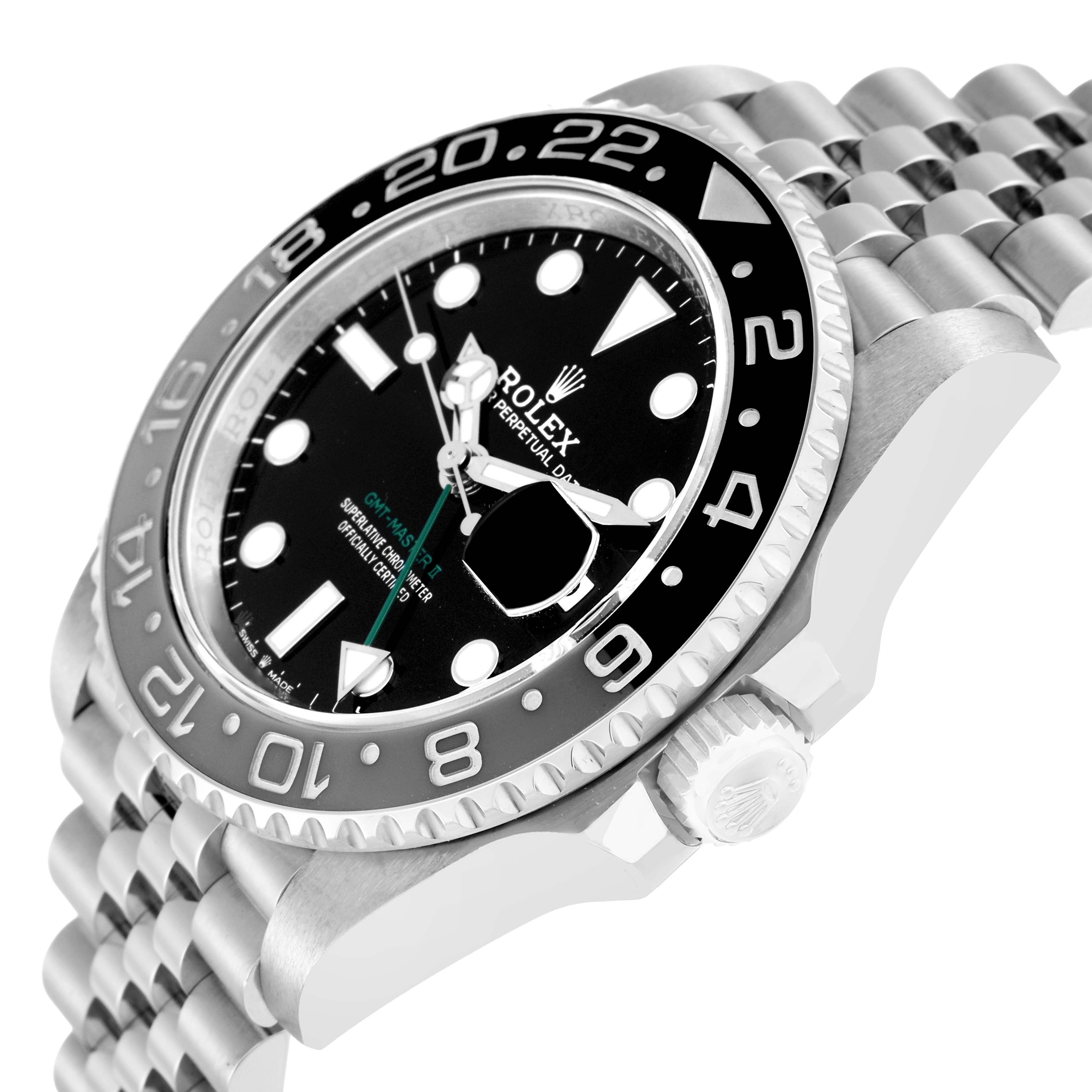 The image shows a Rolex GMT-Master 126710 Men's Stainless Steel Black Dial watch from a high-angle side view, highlighting the bezel, crown, and jubilee bracelet.