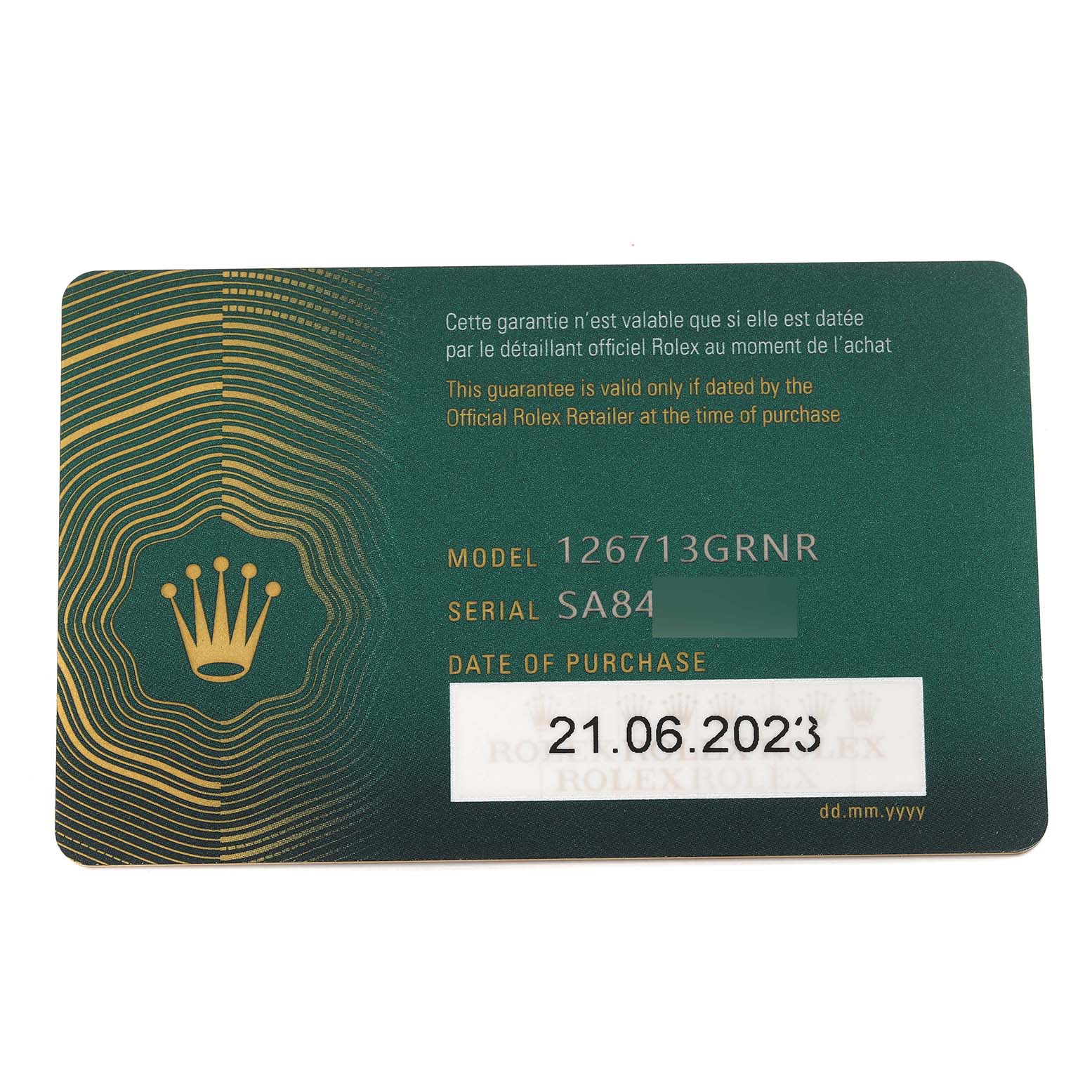 This image shows a warranty card for the Rolex GMT-Master 126713 Men's Steel and Gold (two tone) Black Dial 126713 Men's Steel and Gold (two tone) Black Dial model 126713GRNR.