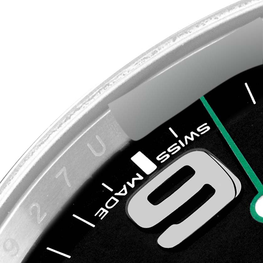 The image shows a close-up of the dial and part of the bezel of the Rolex Air-King 116900 Men's Stainless Steel Black Dial 116900 Men's Stainless Steel Black Dial watch, featuring the number "6" and "Swiss Made" text.