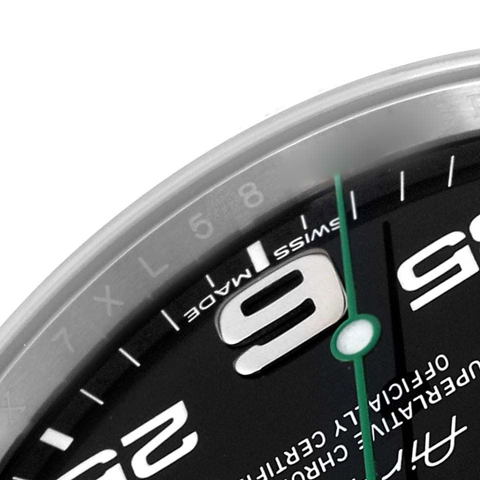 The image shows a close-up of the upper right section of the dial on a Rolex Air-King 116900 Men's Stainless Steel Black Dial 116900 Men's Stainless Steel Black Dial, highlighting the numbers "9" and "25."