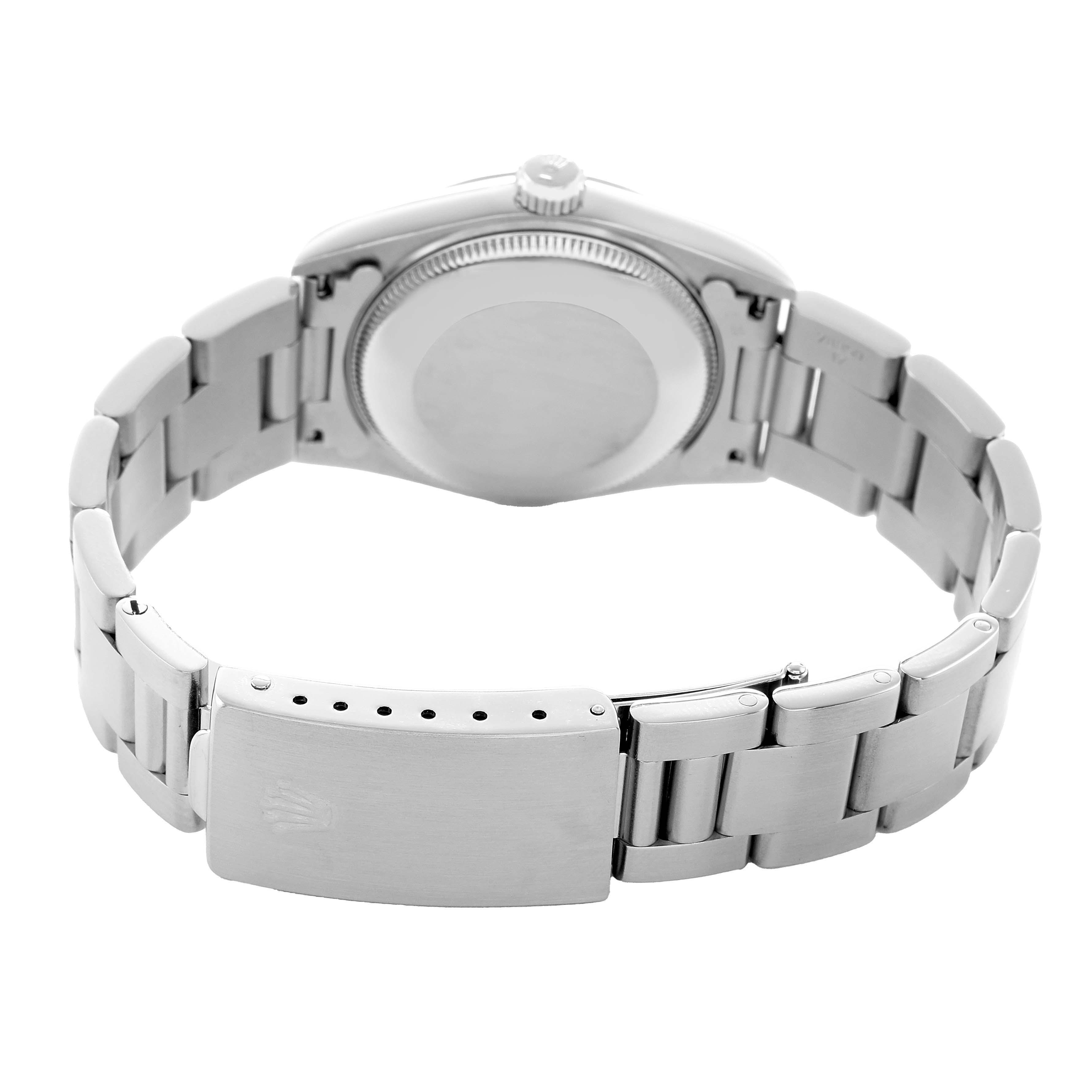 The image shows the back and bracelet of a Rolex Mid-Size 67480 Women's Stainless Steel Pink Dial watch, highlighting the clasp and case back.