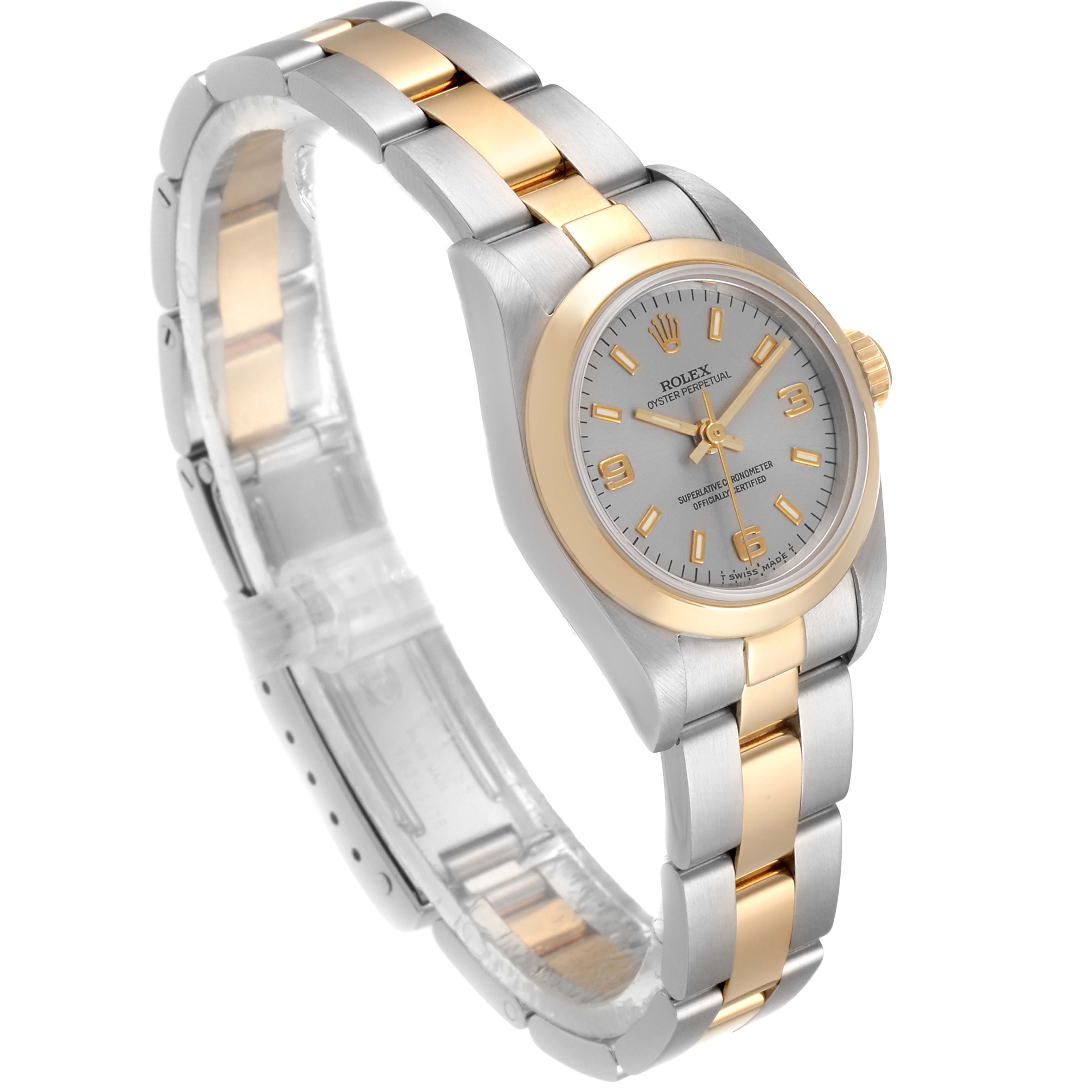 The image shows a side angle of a Rolex Oyster Perpetual 76193 Women's Steel and Gold (two tone) Grey Dial 76193 Women's Steel and Gold (two tone) Grey Dial watch, highlighting its two-tone bracelet, dial, and bezel.