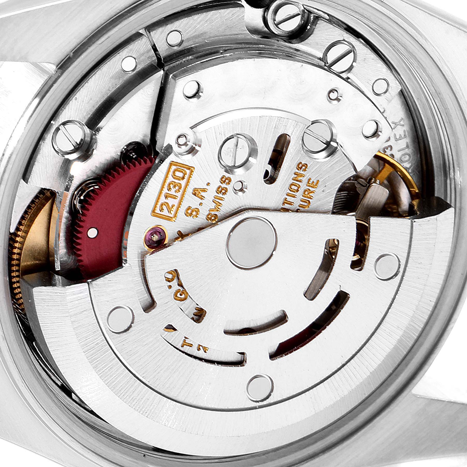 The image shows a detailed view of the movement and inner mechanism of a Rolex Oyster Perpetual 76193 Women's Steel and Gold (two tone) Grey Dial 76193 Women's Steel and Gold (two tone) Grey Dial watch.