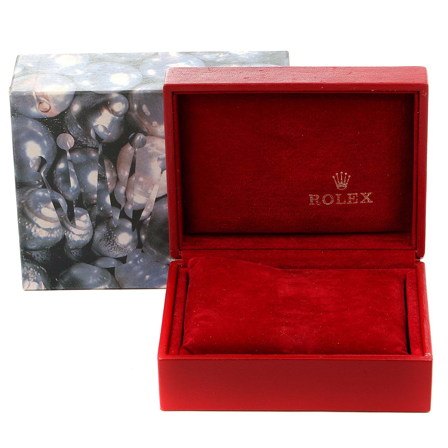 The image shows a red Rolex watch box and its outer packaging for the Oyster Perpetual model.