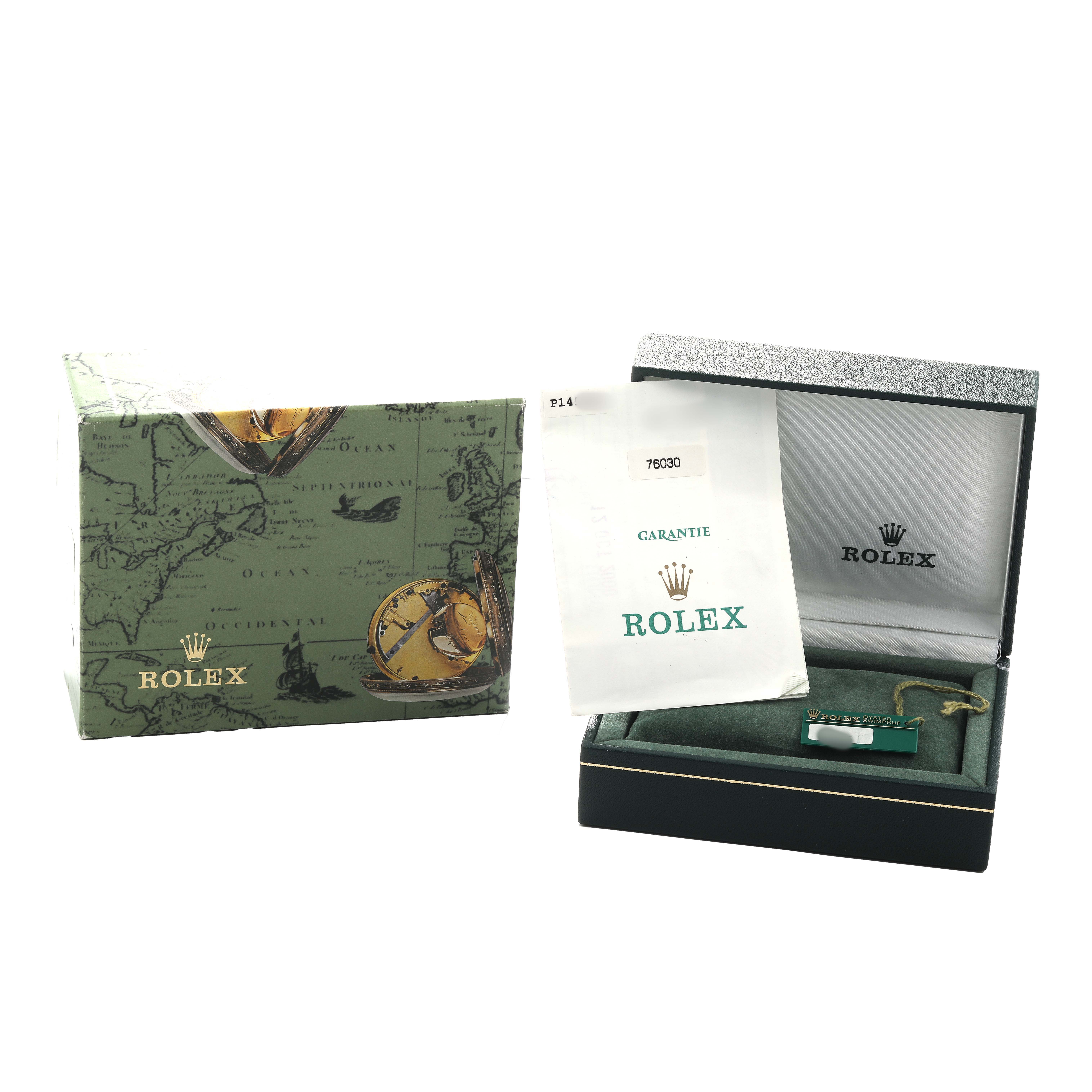 The image shows a Rolex Oyster Perpetual 76030 Women's Stainless Steel White Dial box with a booklet and accessories in an open display.