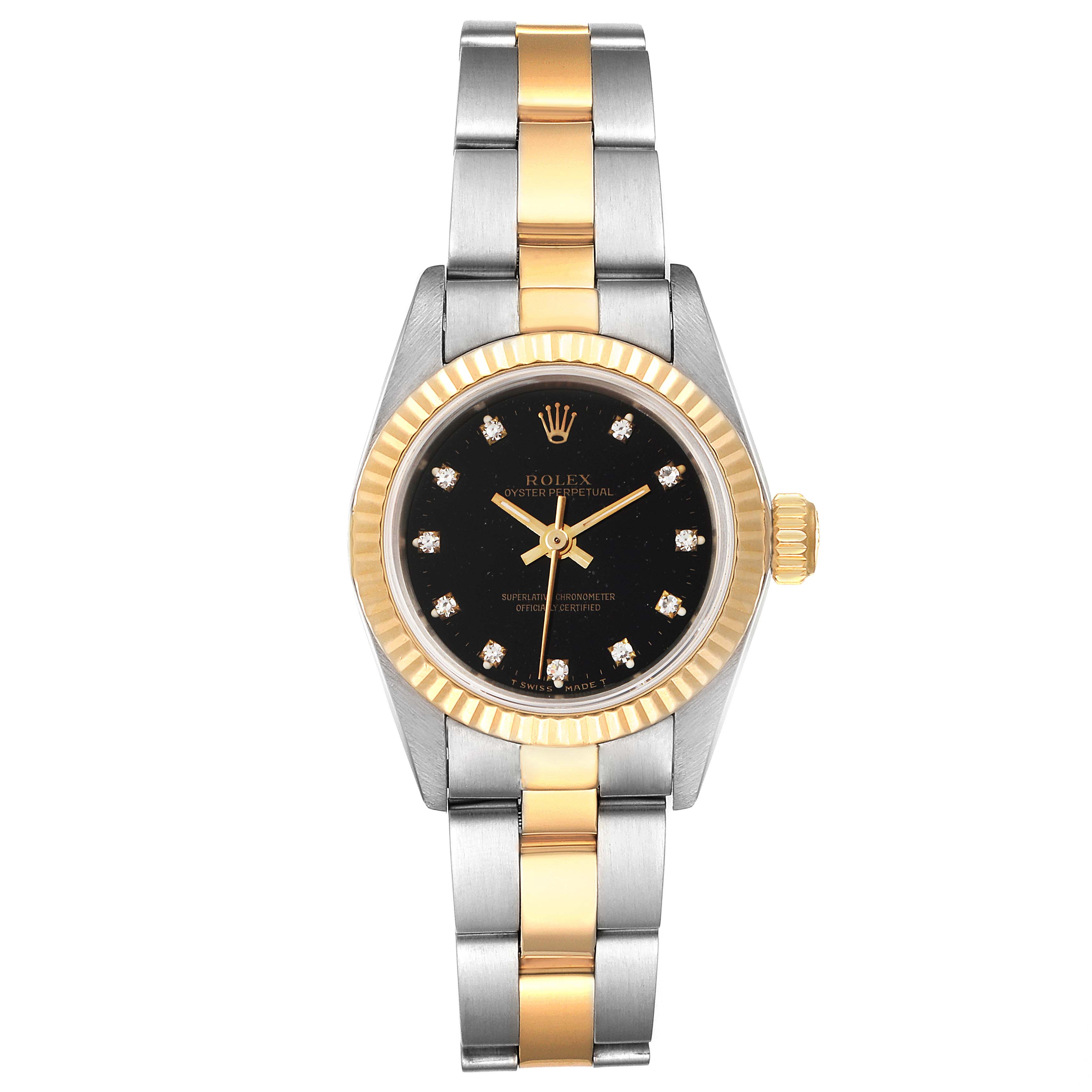 The image shows a front view of a Rolex Oyster Perpetual 67193 Women
s Steel and Gold (two tone) Black Dial 67193 Women
s Steel and Gold (two tone) Black Dial watch with a two-tone metal bracelet and black dial.