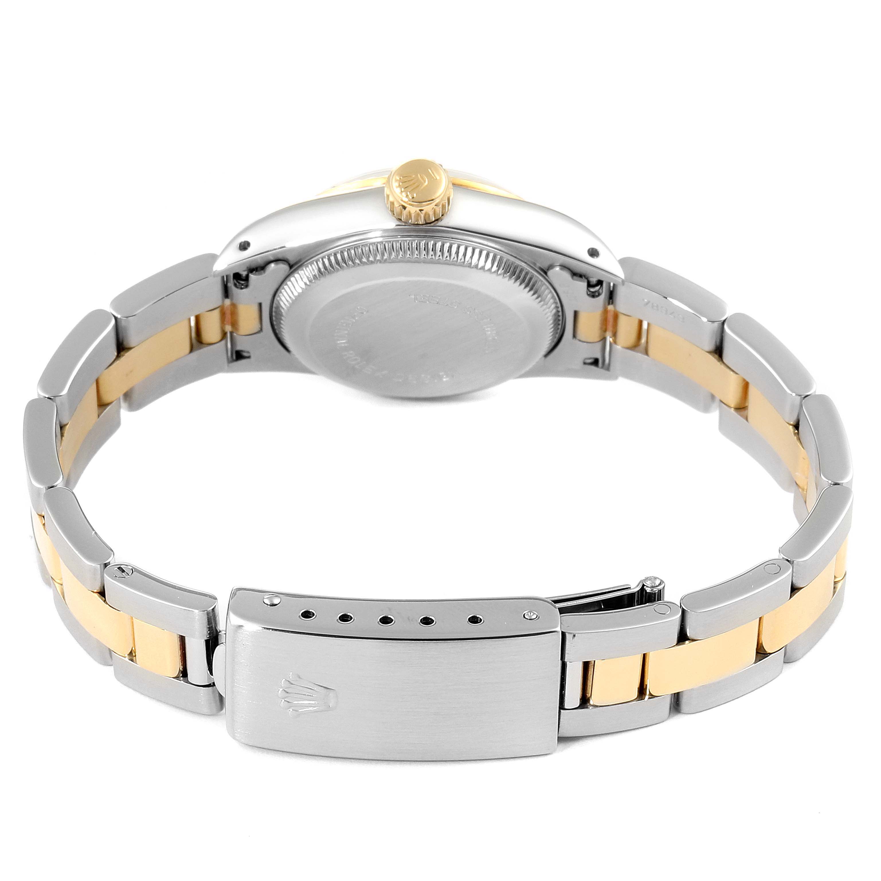 This image shows the back view of the Rolex Oyster Perpetual 67193 Women
s Steel and Gold (two tone) Black Dial 67193 Women
s Steel and Gold (two tone) Black Dial watch, including the case back, bracelet, and clasp.