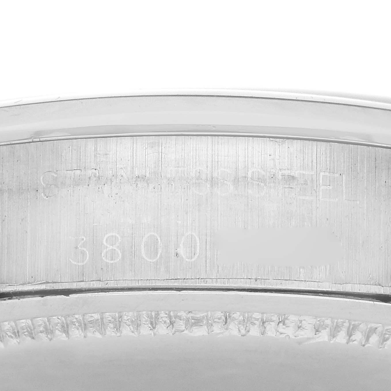 The image shows the side profile of the Rolex Vintage Collection 6694 Men's Stainless Steel Pink Dial 6694 Men's Stainless Steel Pink Dial's case with visible engravings.