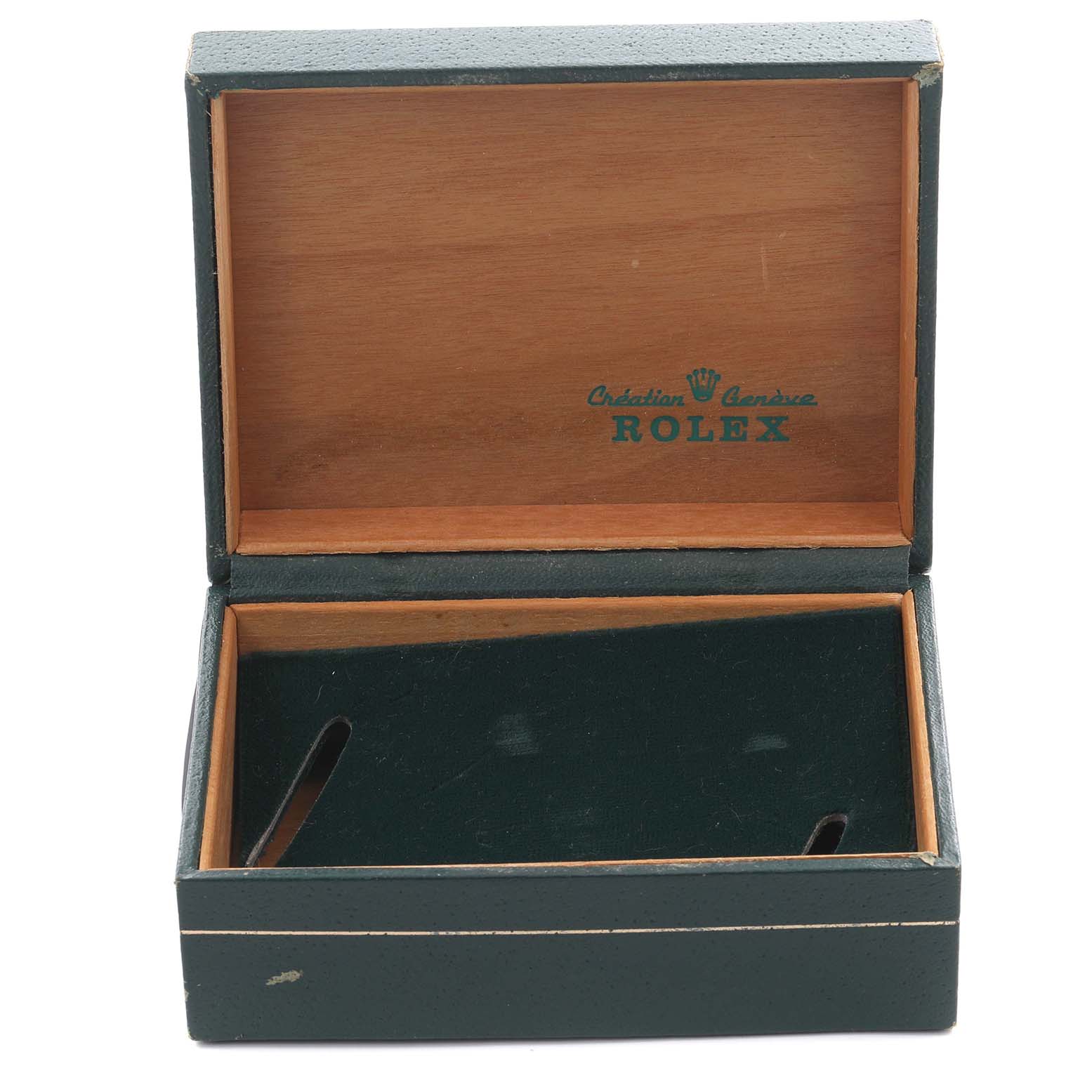The image shows an open Rolex watch box from the Vintage Collection, displaying the interior and logo.