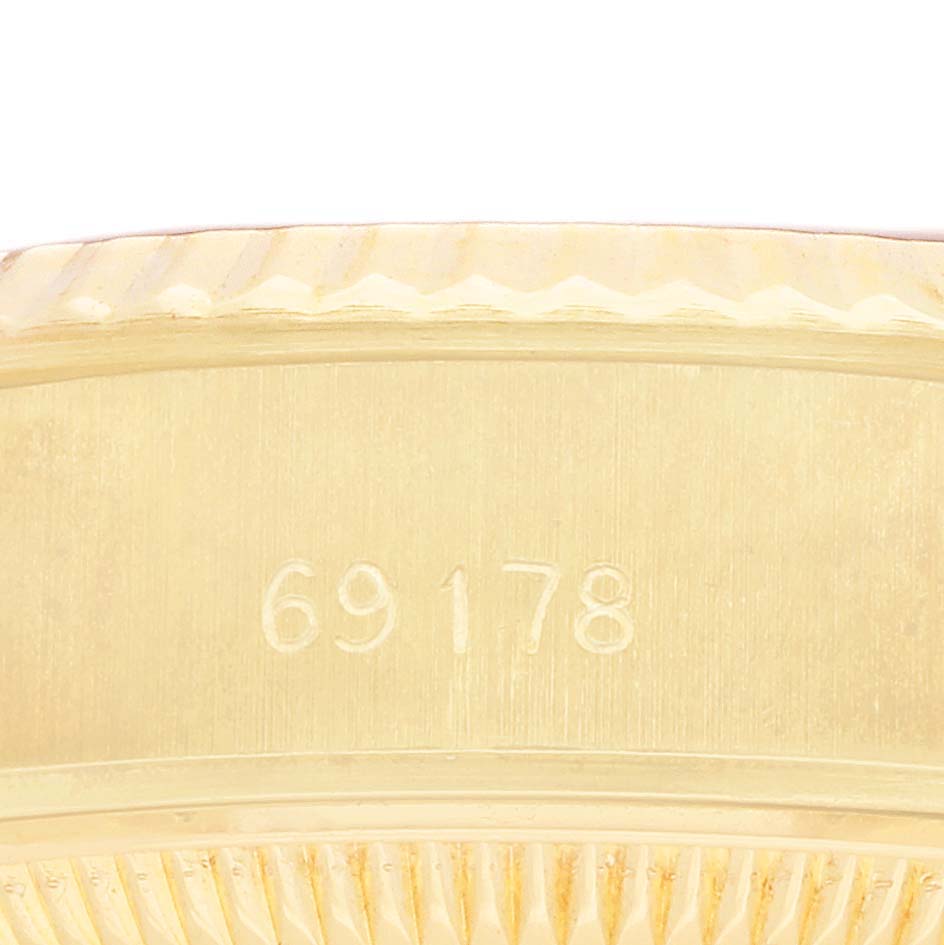 This image shows a close-up of the case edge of a Rolex President 69178 Women's Yellow Gold Champagne Dial model, featuring the reference number 69178.