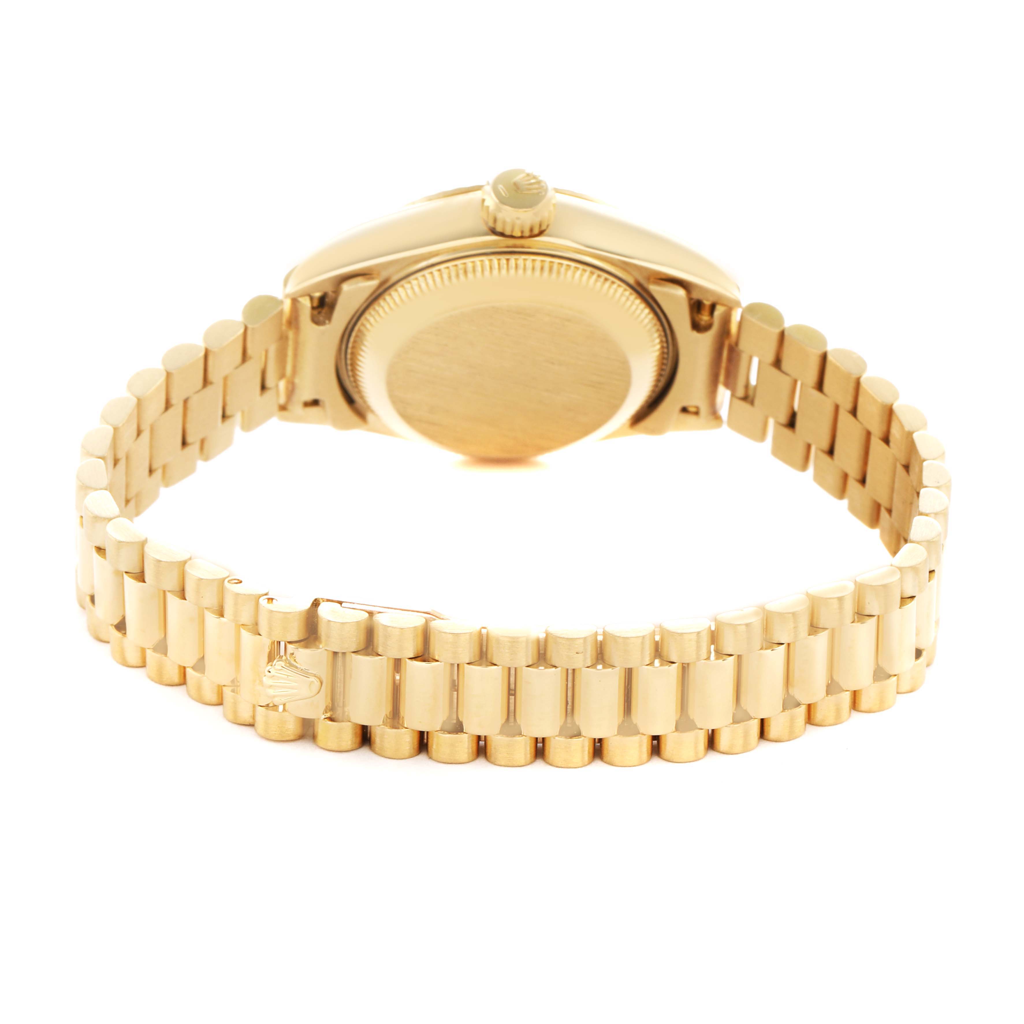 The Rolex President 69178 Women's Yellow Gold Champagne Dial model is shown from the back, highlighting the case back, crown, and bracelet clasp with logo.