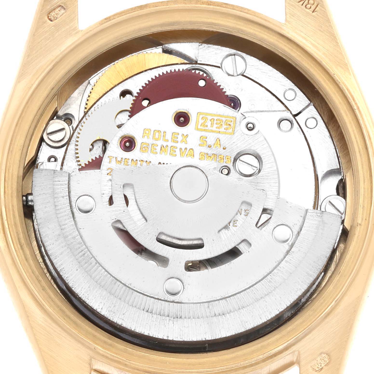 The image shows the movement of a Rolex President 69178 Women's Yellow Gold Champagne Dial model watch from a top-down angle, highlighting gears and components.