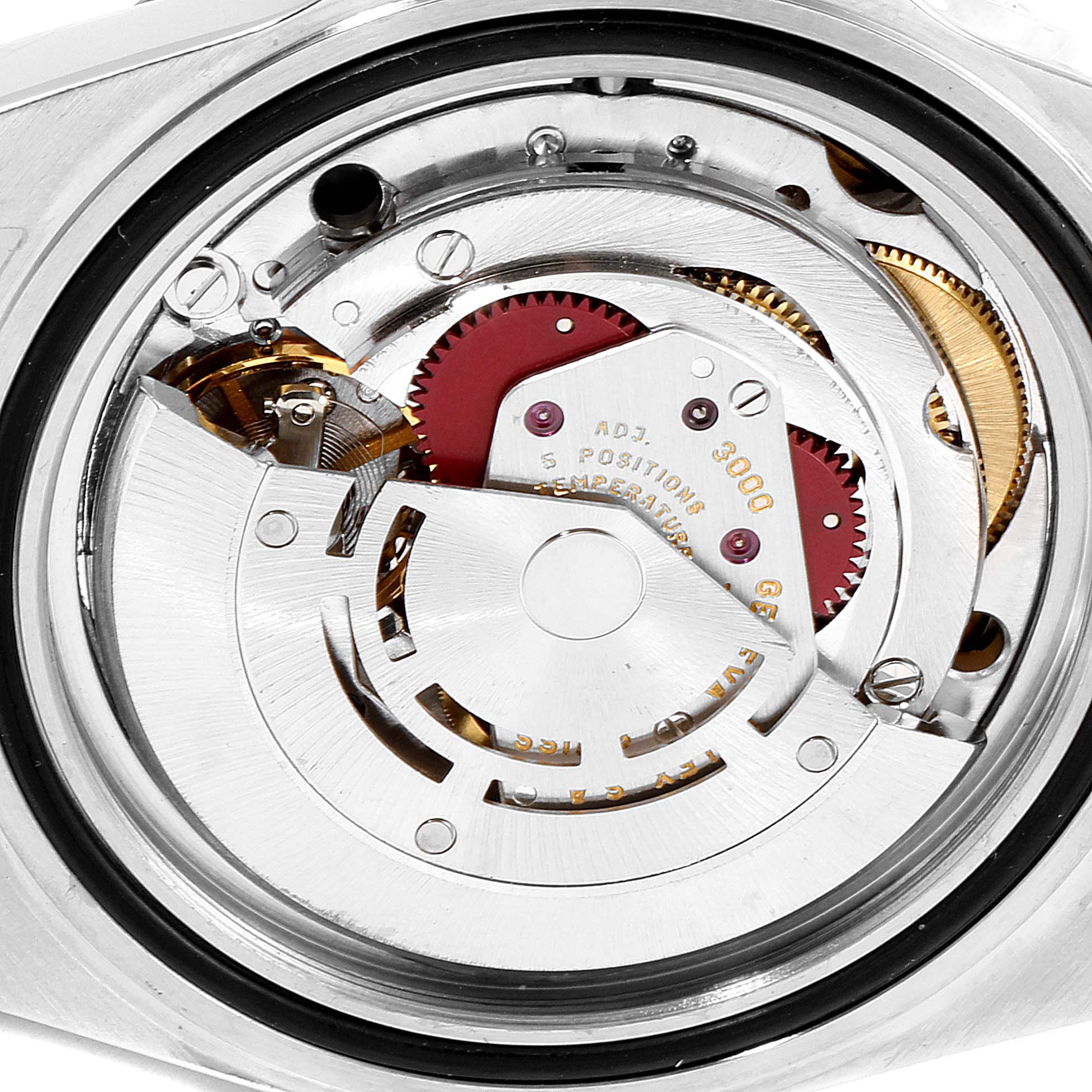 The image shows the intricate movement mechanism of a Rolex Submariner 14060 Men
s Stainless Steel Black Dial 14060 Men
s Stainless Steel Black Dial watch from a back angle.