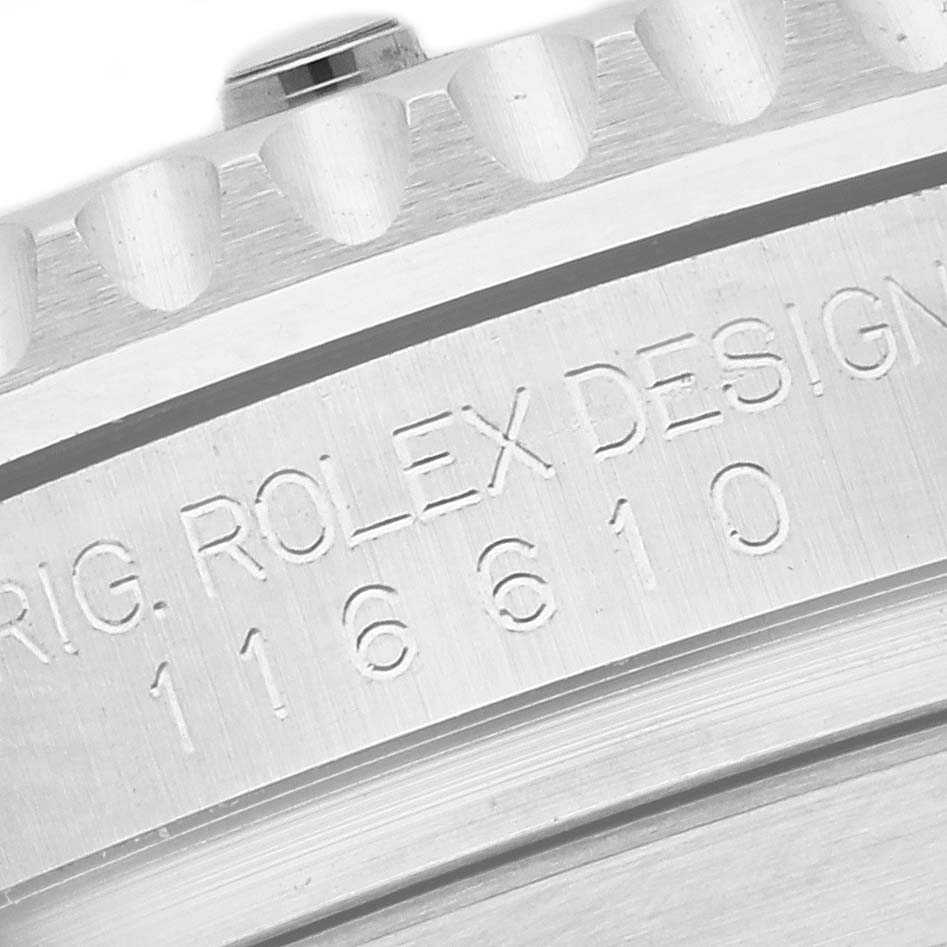 The image shows a close-up of the engraved side of a Rolex Submariner 116610LV Men's Stainless Steel Green Dial 116610LV Men's Stainless Steel Green Dial, displaying the model number and branding.