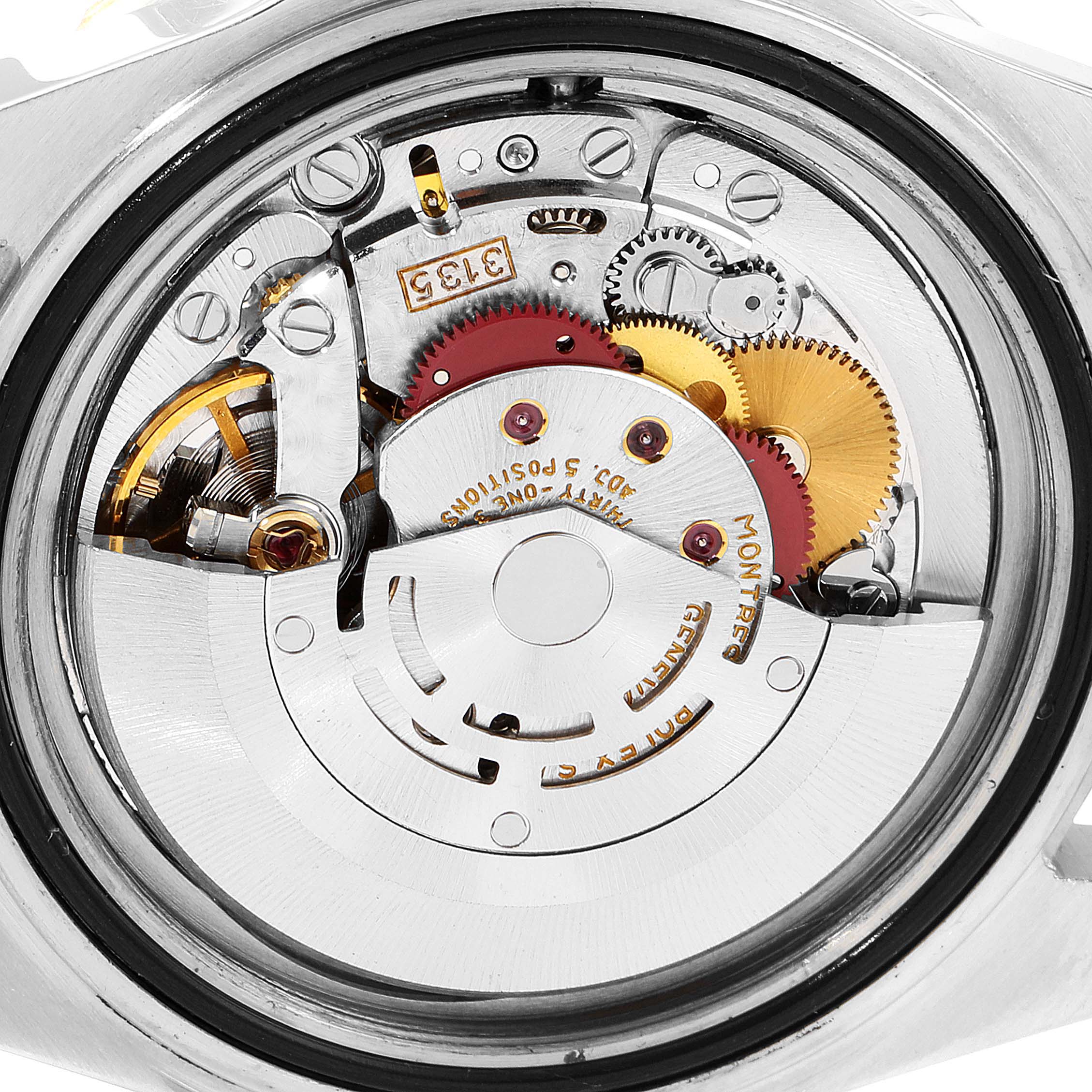 This close-up view shows the intricate internal mechanism of the Rolex Submariner 16613 Men's Steel and Gold (two tone) Blue Dial 16613 Men's Steel and Gold (two tone) Blue Dial watch.