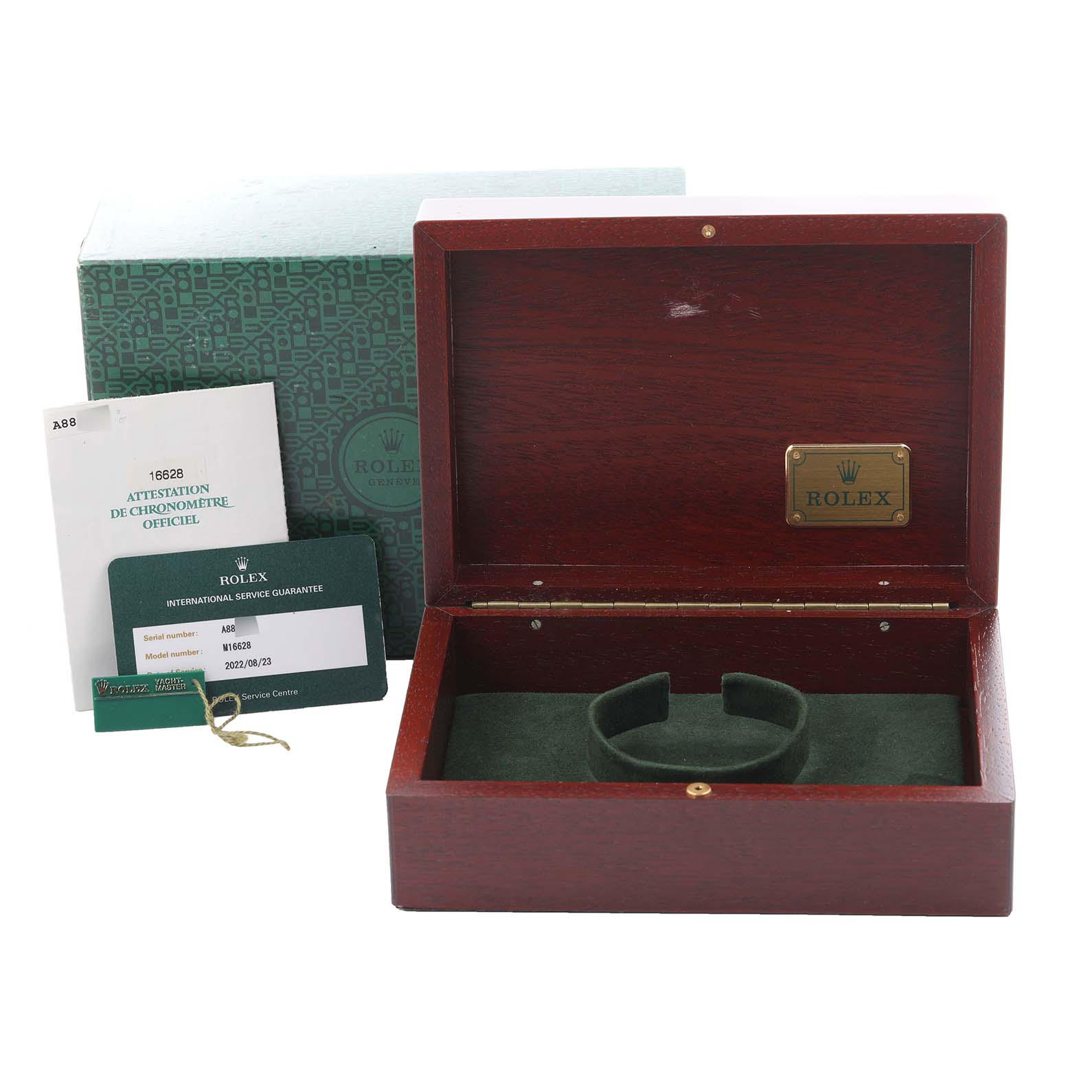 The Rolex Yacht-Master 16628 Men's Yellow Gold White Dial 16628 Men's Yellow Gold White Dial accessories shown include a wooden box, paperwork, and a service card.