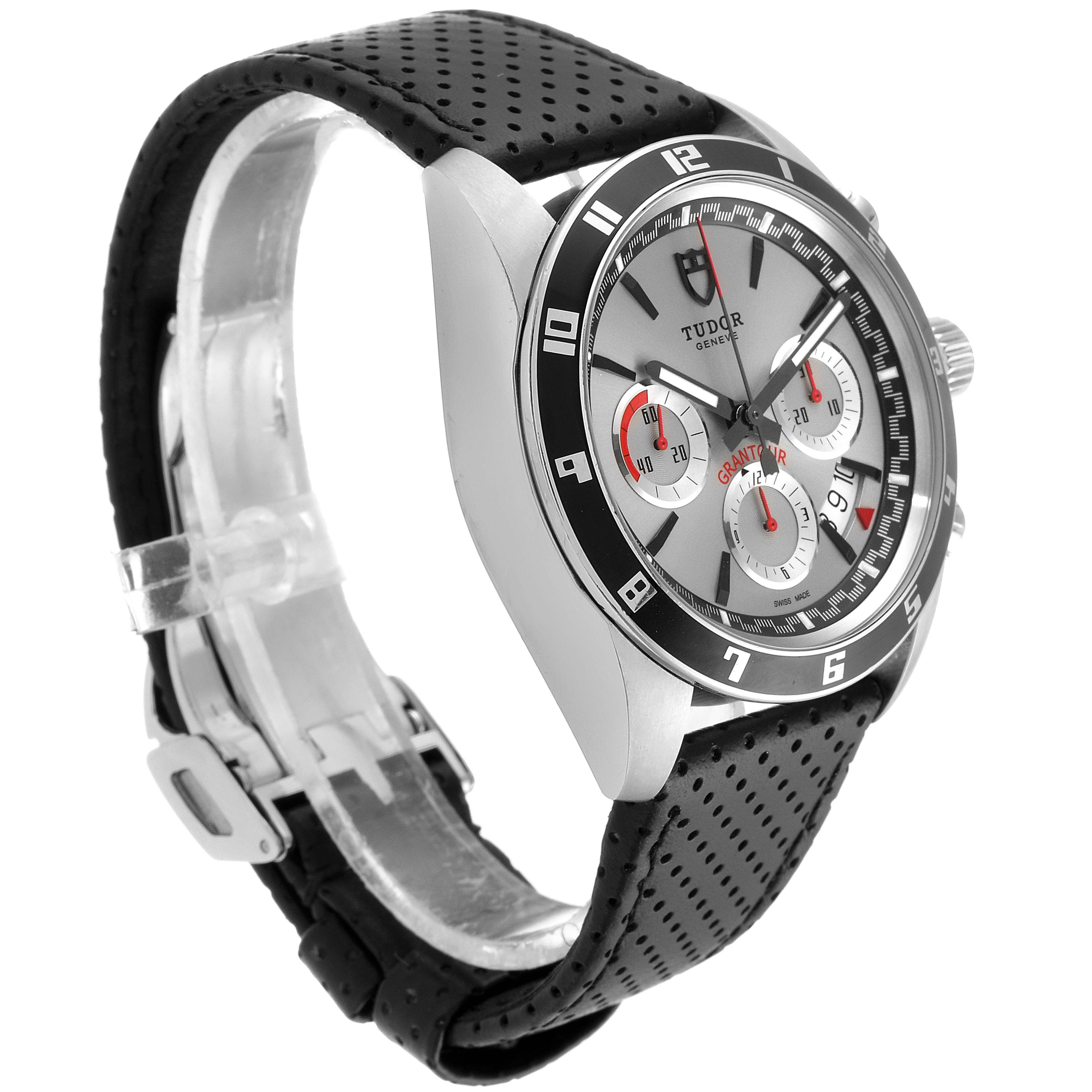 The image shows a Tudor Grantour 20530N Men
s Stainless Steel Silver Dial 20530N Men
s Stainless Steel Silver Dial watch at a three-quarter angle, highlighting its dial, bezel, and perforated strap.