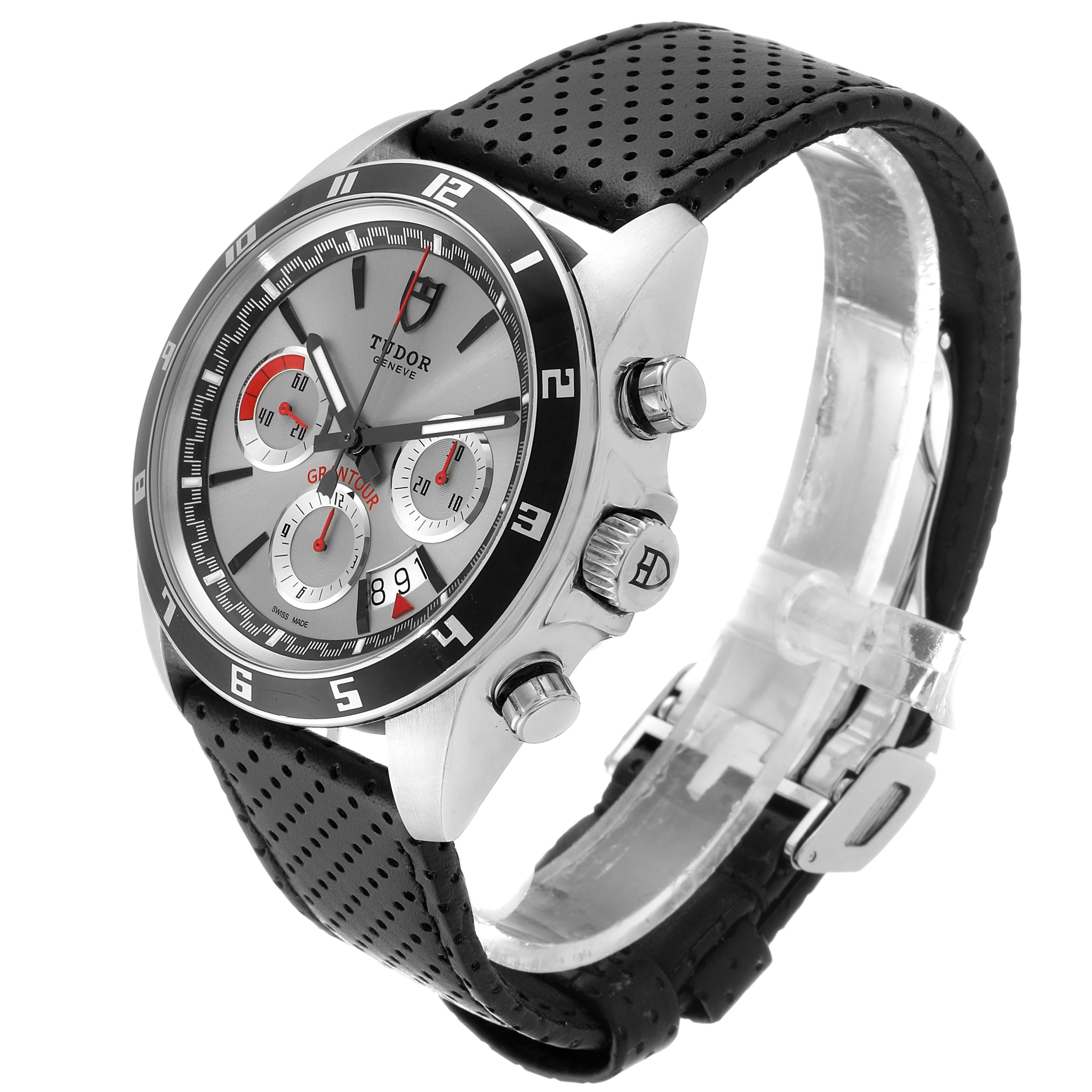 The image shows a Tudor Grantour 20530N Men
s Stainless Steel Silver Dial 20530N Men
s Stainless Steel Silver Dial watch at a three-quarter angle, highlighting the face, side buttons, bezel, and perforated strap.