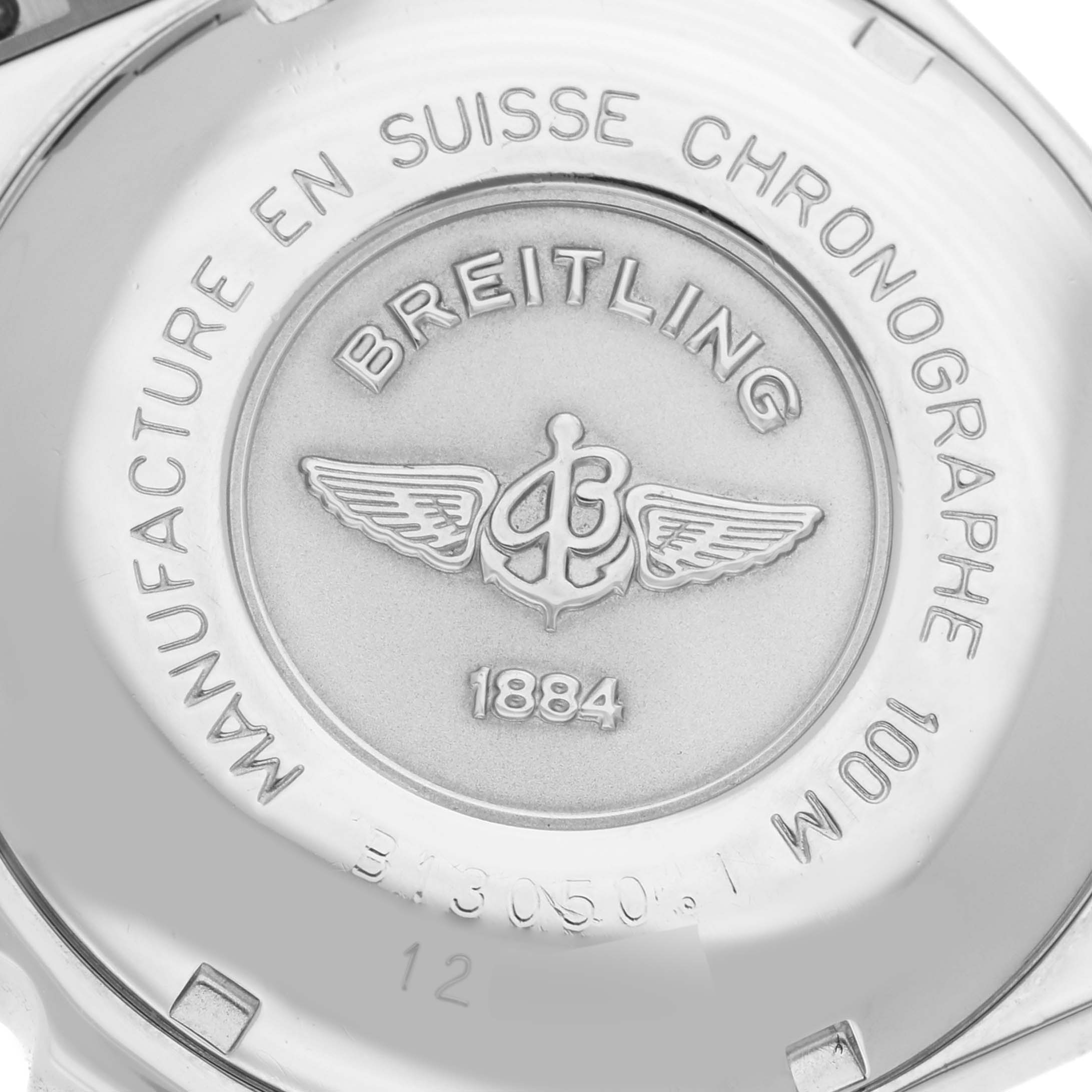 The image shows the back case of a Breitling Chronomat B13050 Men's Stainless Steel Blue Dial B13050 Men's Stainless Steel Blue Dial watch, displaying the brand logo and inscriptions.