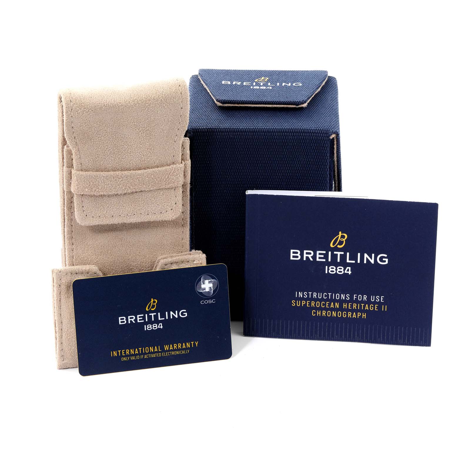 Accessories for the Breitling Superocean A13313 Men's Stainless Steel Blue Dial A13313 Men's Stainless Steel Blue Dial watch include packaging, warranty card, and instruction manual, viewed from the front.