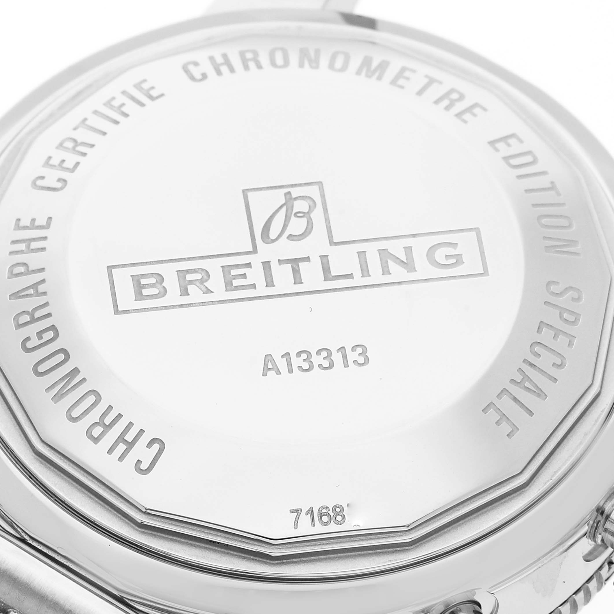 This is a close-up view of the case back of a Breitling Superocean A13313 Men's Stainless Steel Blue Dial A13313 Men's Stainless Steel Blue Dial watch, showing branding and model details.