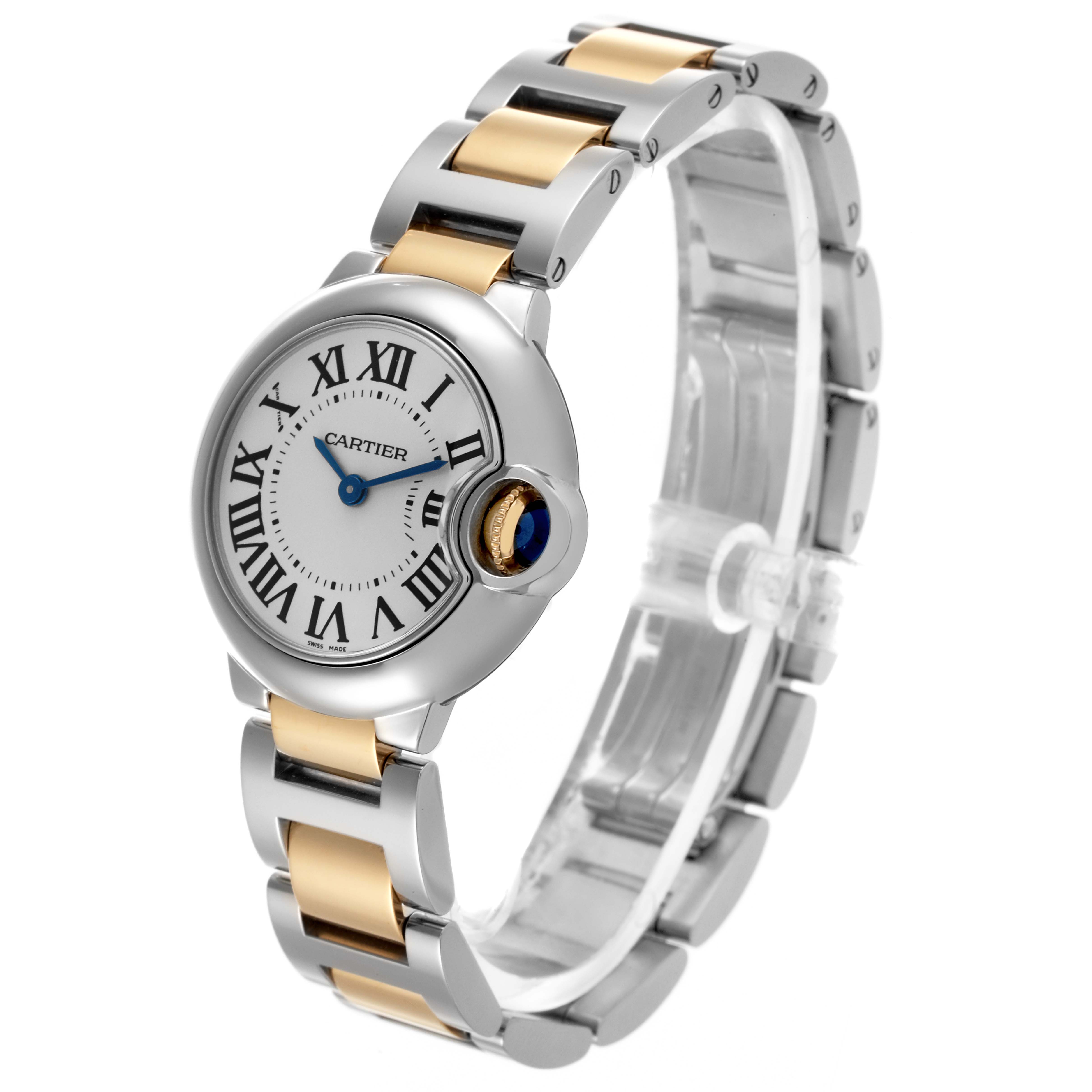 The Cartier Ballon Bleu W69007Z3 Women
s Steel and Gold (two tone) Silver Dial W69007Z3 Women
s Steel and Gold (two tone) Silver Dial watch is shown at an angled view, highlighting its two-tone bracelet and sapphire cabochon crown.
