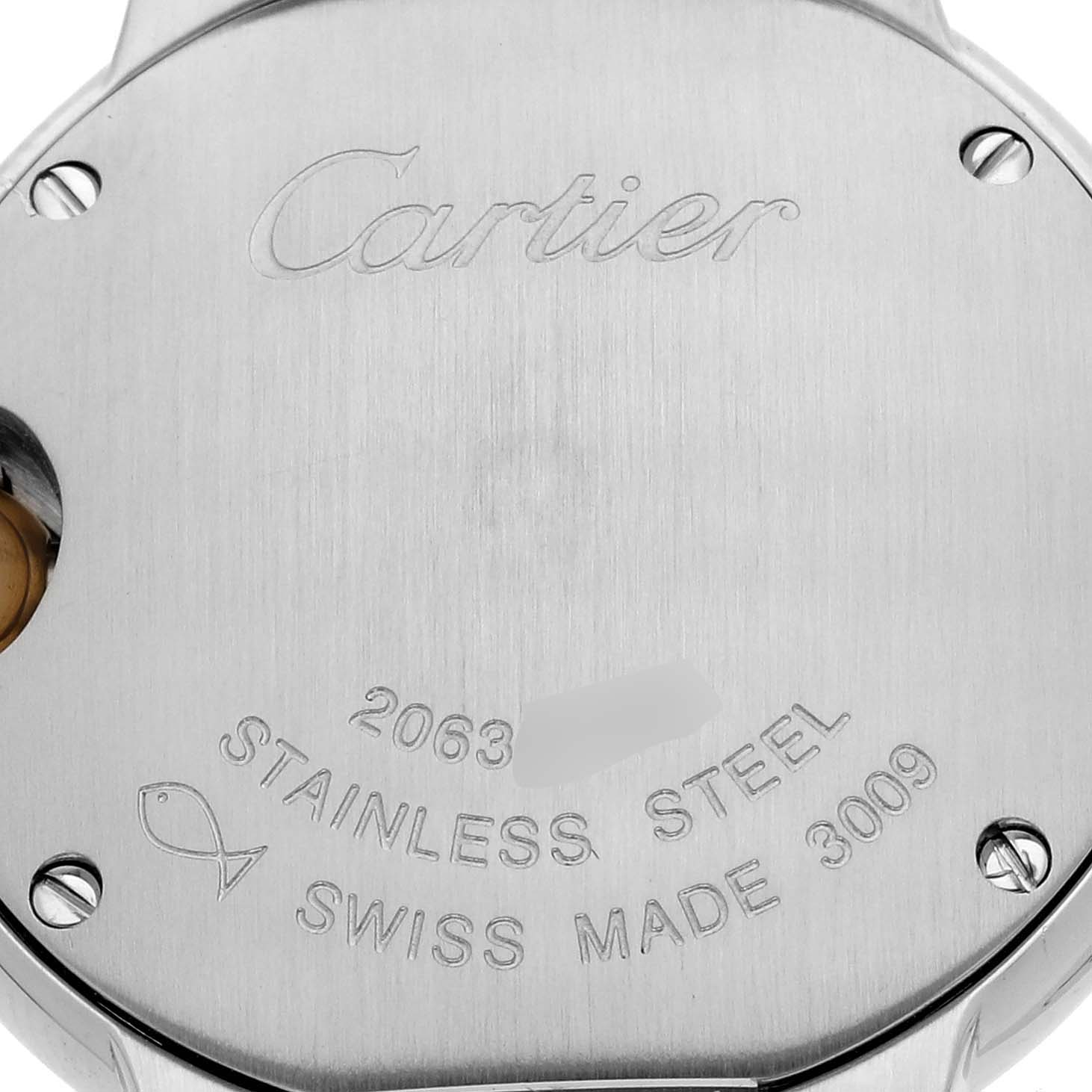The image shows the stainless steel back of a Cartier Ballon Bleu W69007Z3 Women
s Steel and Gold (two tone) Silver Dial W69007Z3 Women
s Steel and Gold (two tone) Silver Dial watch with engraved details and screws.