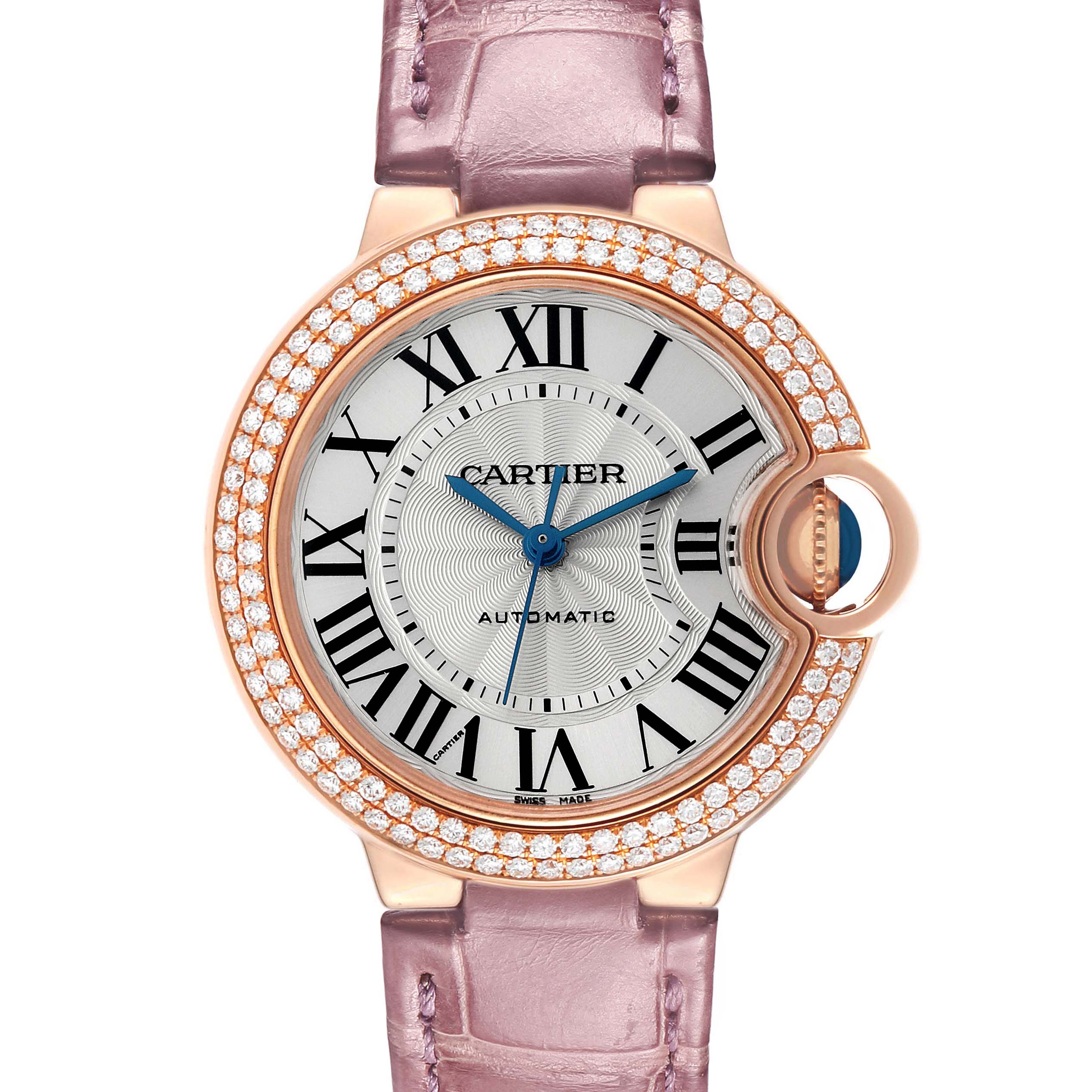 The Cartier Ballon Bleu WE902066 Women's Rose Gold Silver Dial watch is shown from the front, highlighting its round face, diamond bezel, and lavender strap.